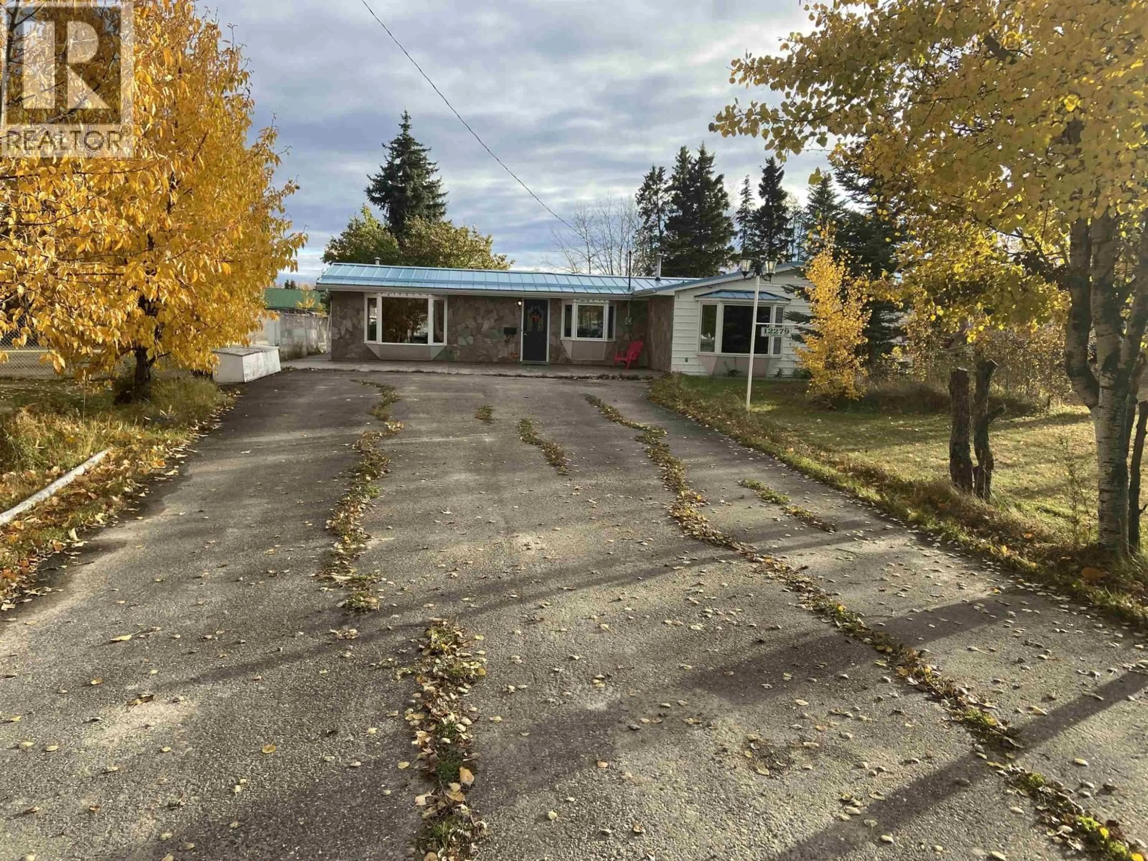 A pic from outside/outdoor area/front of a property/back of a property/a pic from drone, street for 12279 COTTONWOOD AVENUE, Fort St. John British Columbia V1J8B1