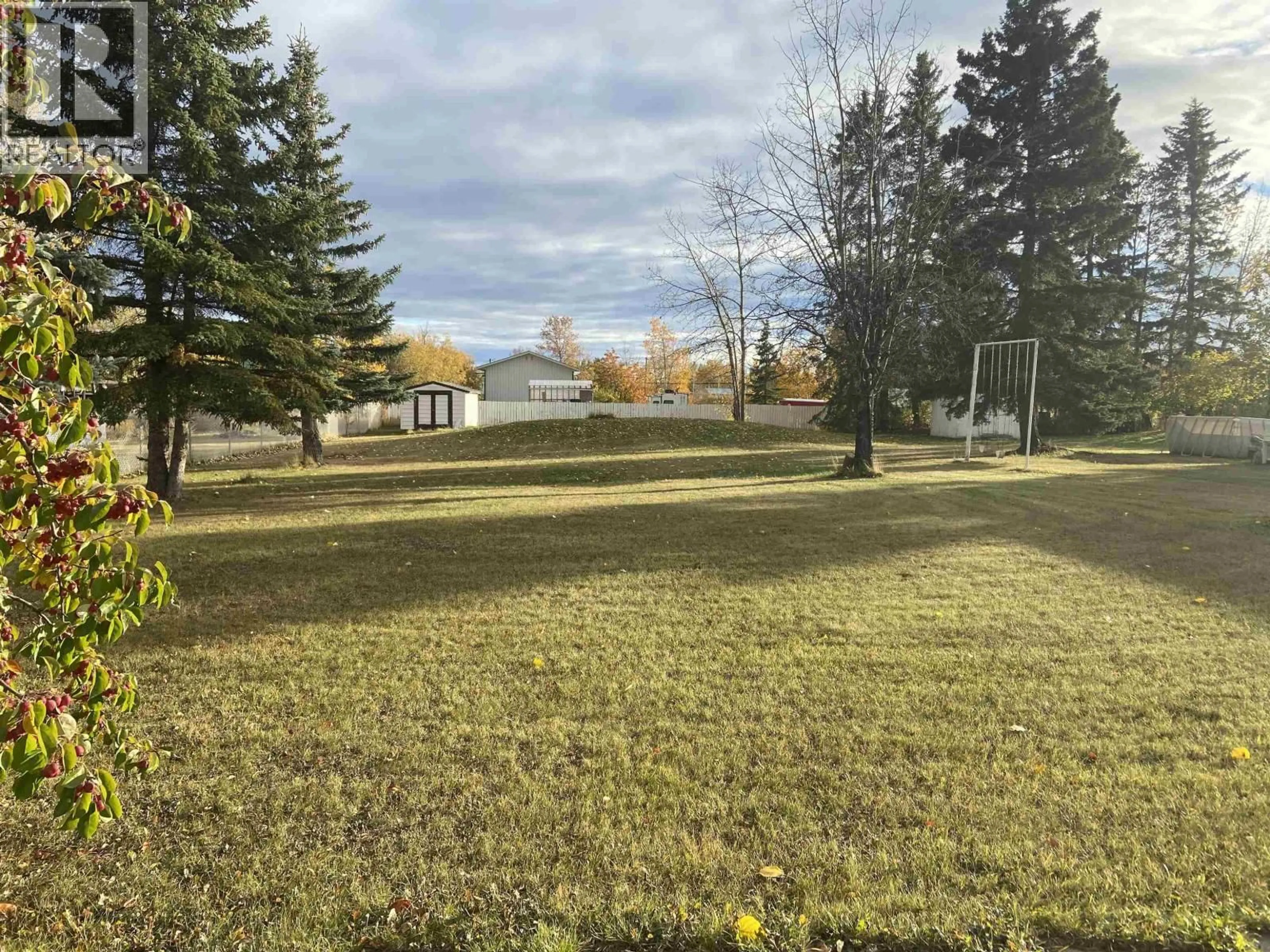 A pic from outside/outdoor area/front of a property/back of a property/a pic from drone, unknown for 12279 COTTONWOOD AVENUE, Fort St. John British Columbia V1J8B1