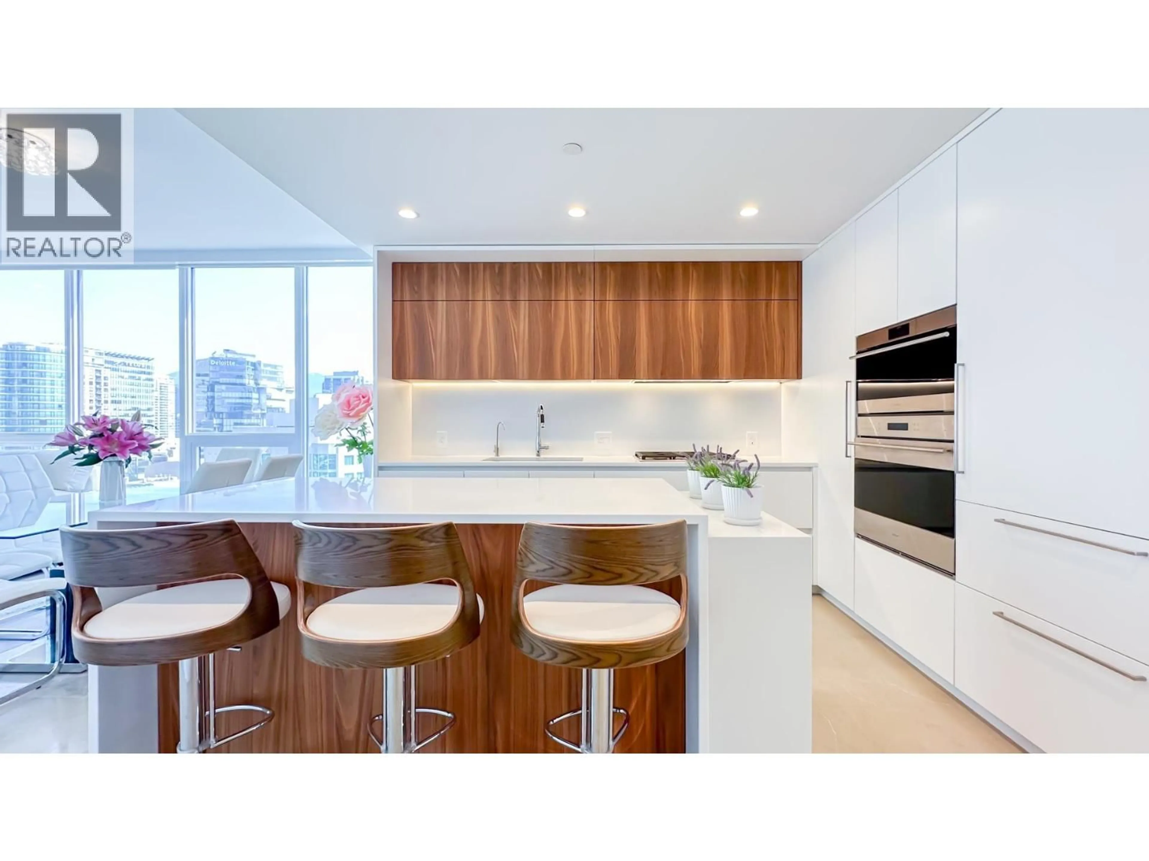 Contemporary kitchen, wood/laminate floor for 2301 - 885 CAMBIE STREET, Vancouver British Columbia V6B0R6