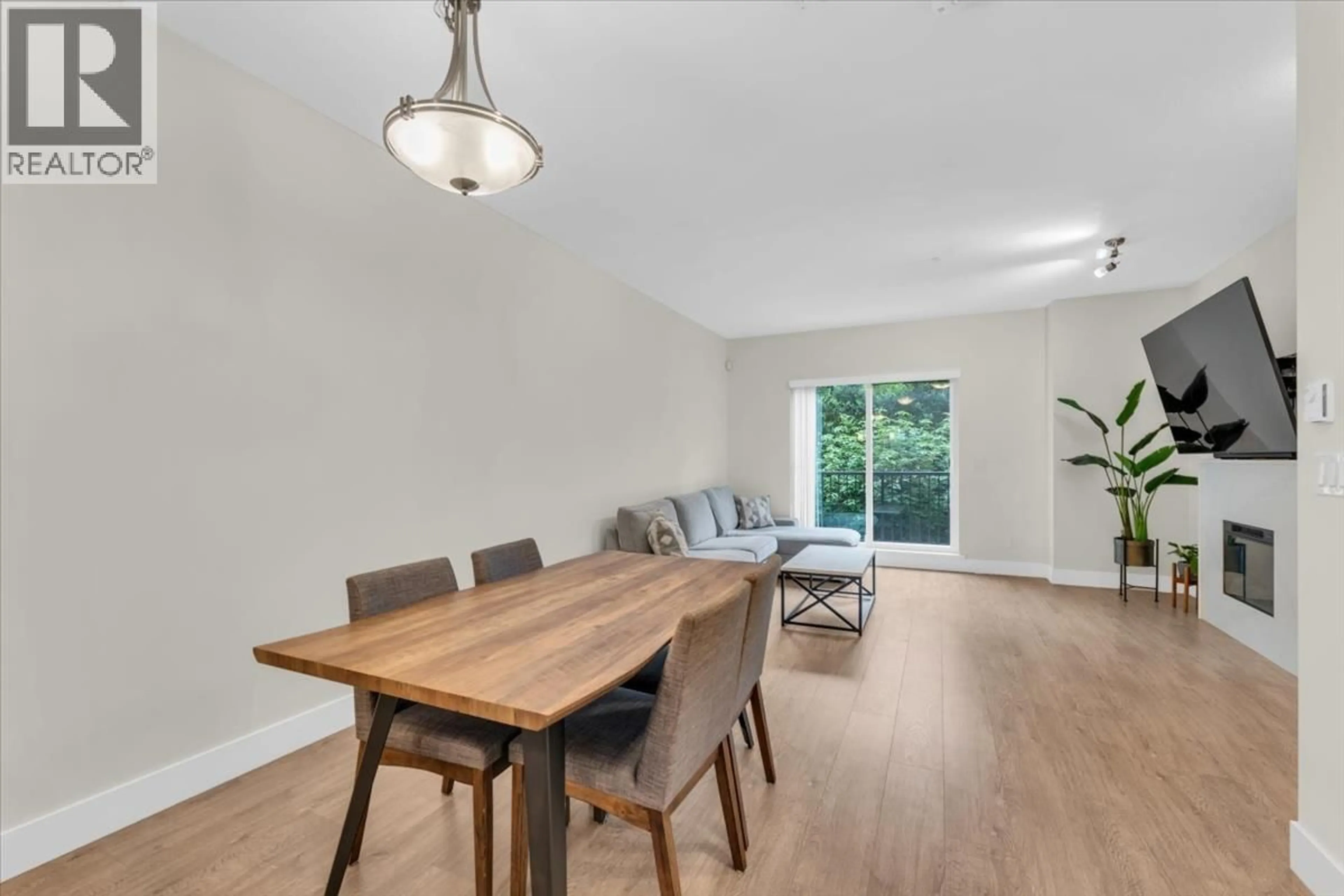 Dining room, wood/laminate floor for 206 - 3888 NORFOLK STREET, Burnaby British Columbia V5G1E5