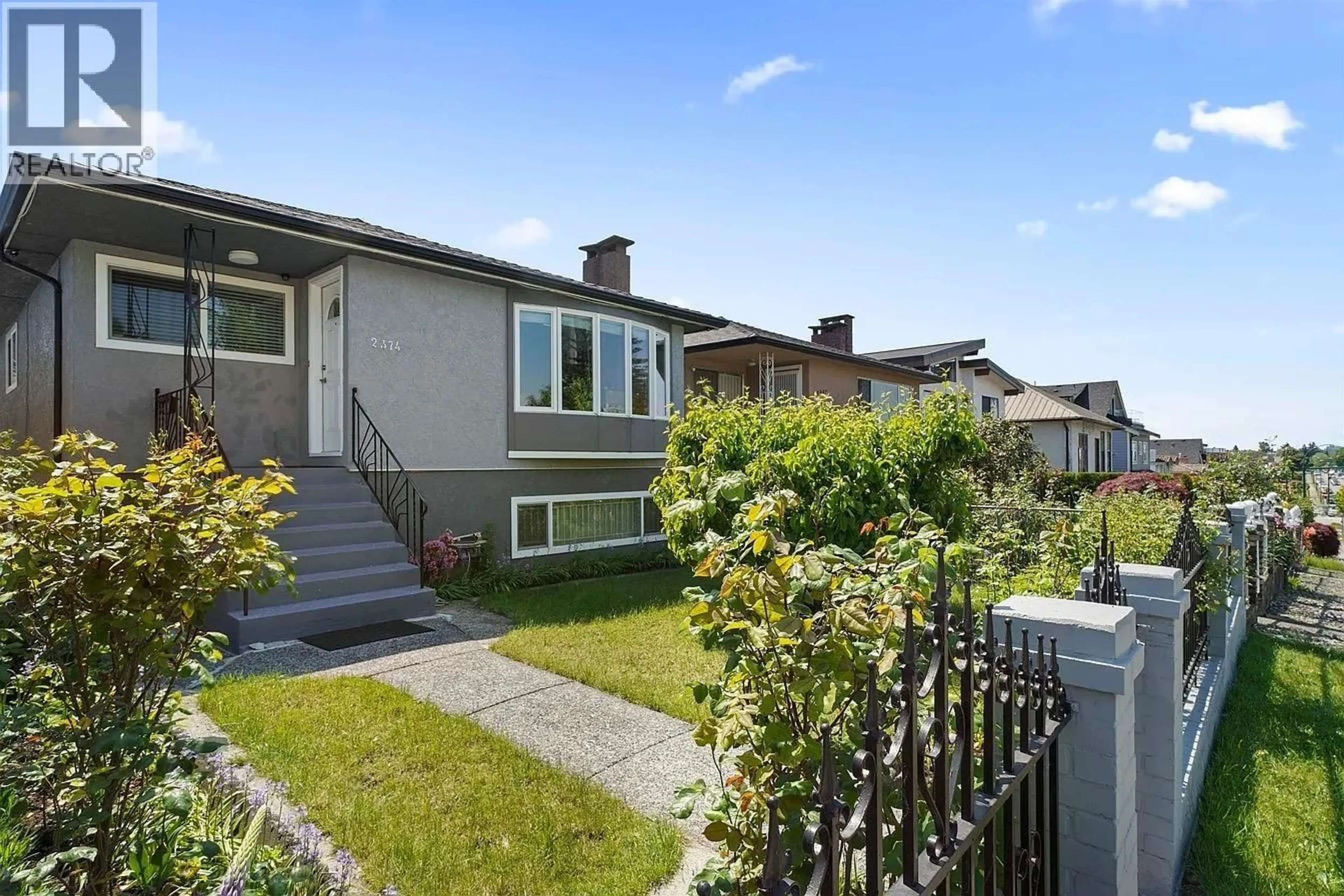 A pic from outside/outdoor area/front of a property/back of a property/a pic from drone, street for 2374 33RD AVENUE, Vancouver British Columbia V5R2S3