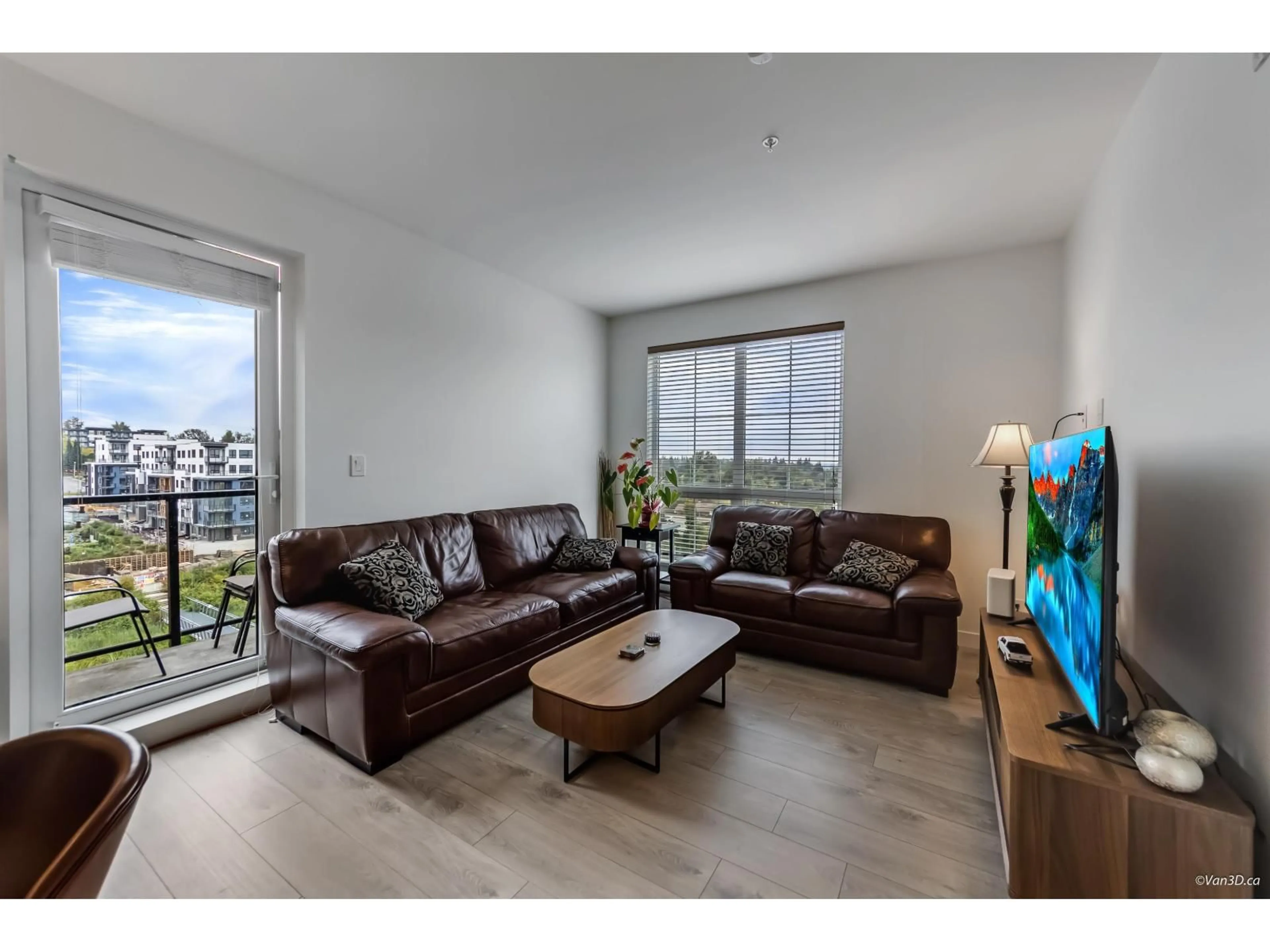 Living room with furniture, wood/laminate floor for 606 - 20052 83A, Langley British Columbia V2Y3P4