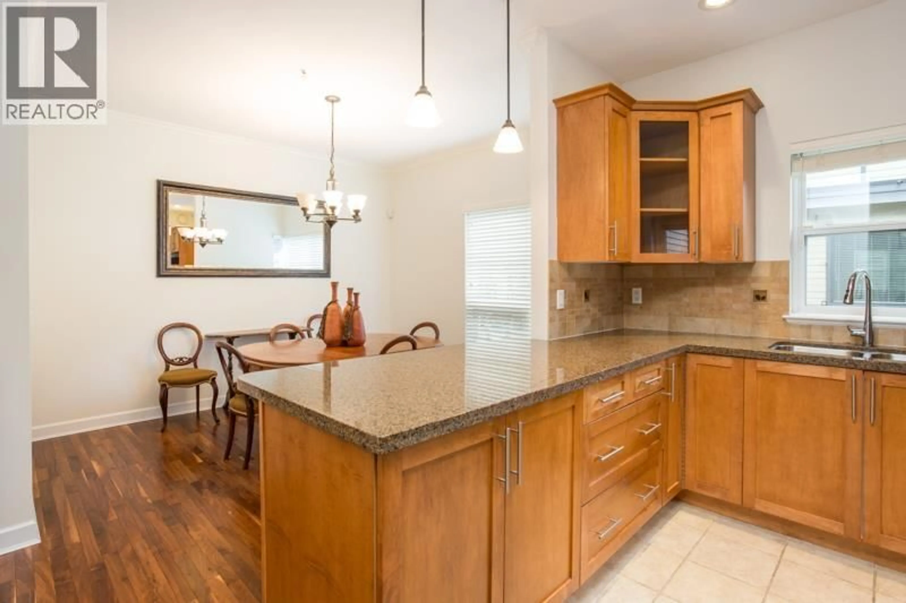 Open concept kitchen, ceramic/tile floor for 10 - 3150 SUNNYHURST ROAD, North Vancouver British Columbia V7K2G3
