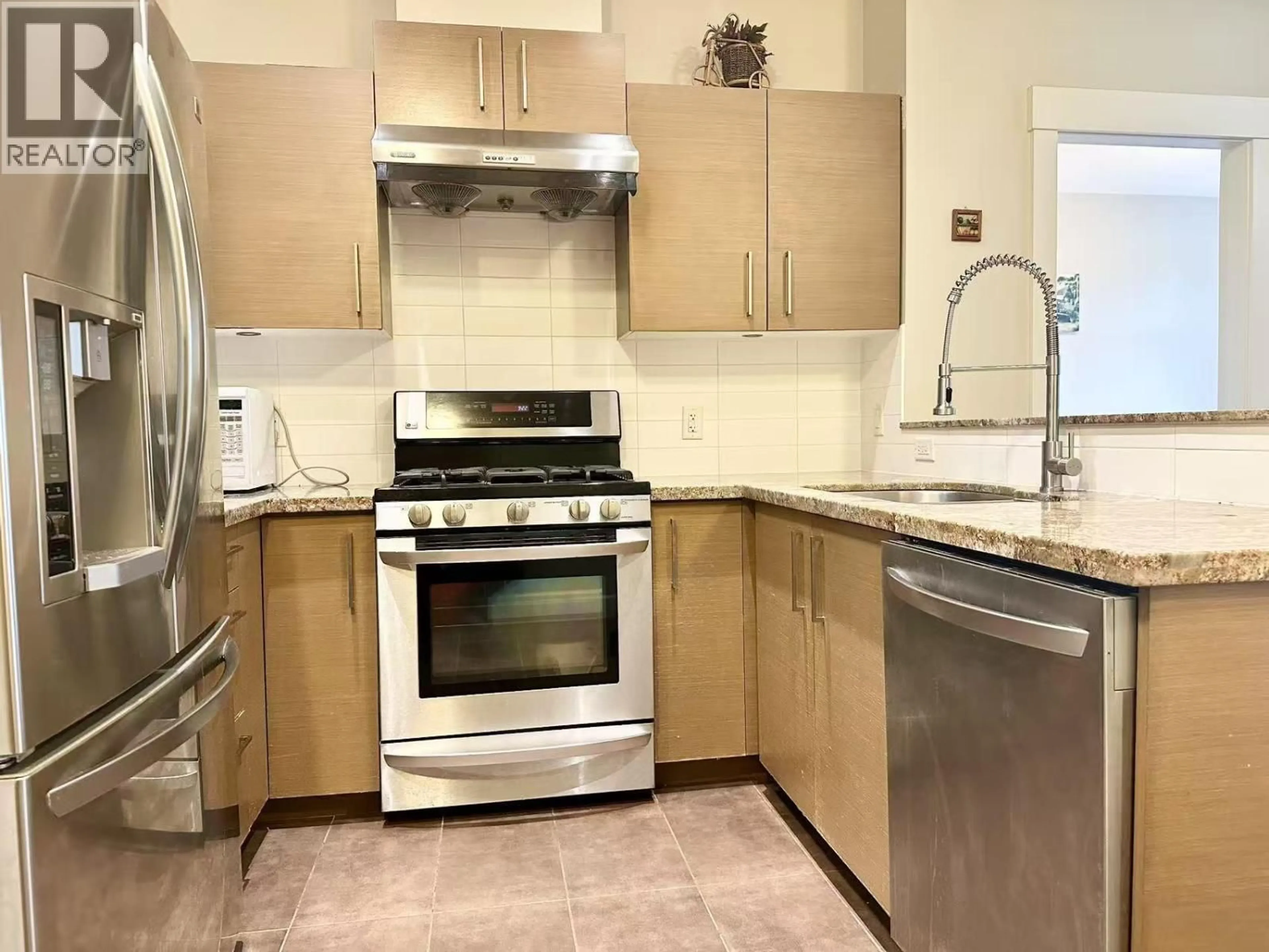 Standard kitchen, ceramic/tile floor for 110 - 6611 ECKERSLEY ROAD, Richmond British Columbia V6Y0B7