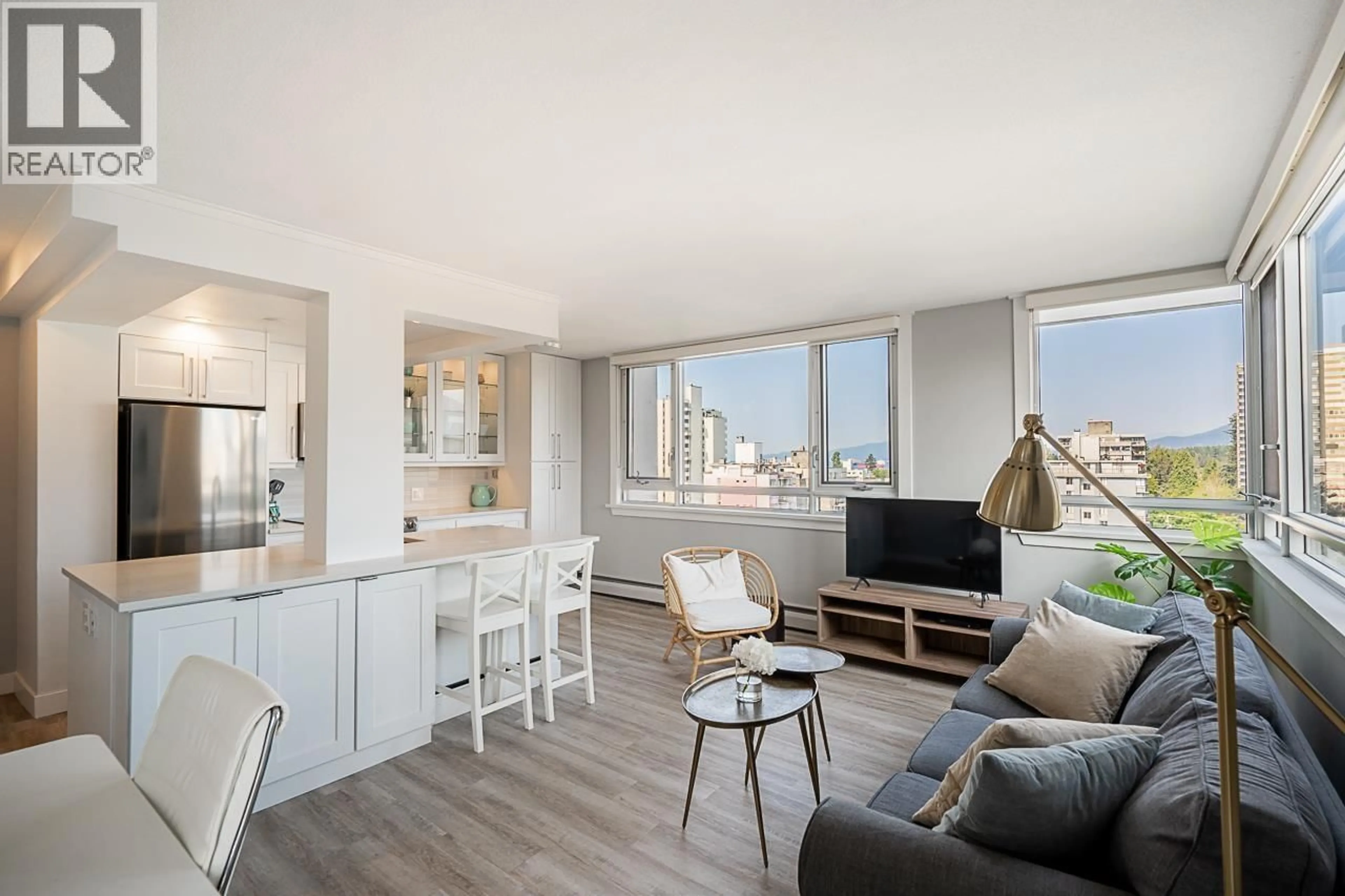 Living room with furniture, wood/laminate floor for 1206 - 1850 COMOX STREET, Vancouver British Columbia V6G1R3