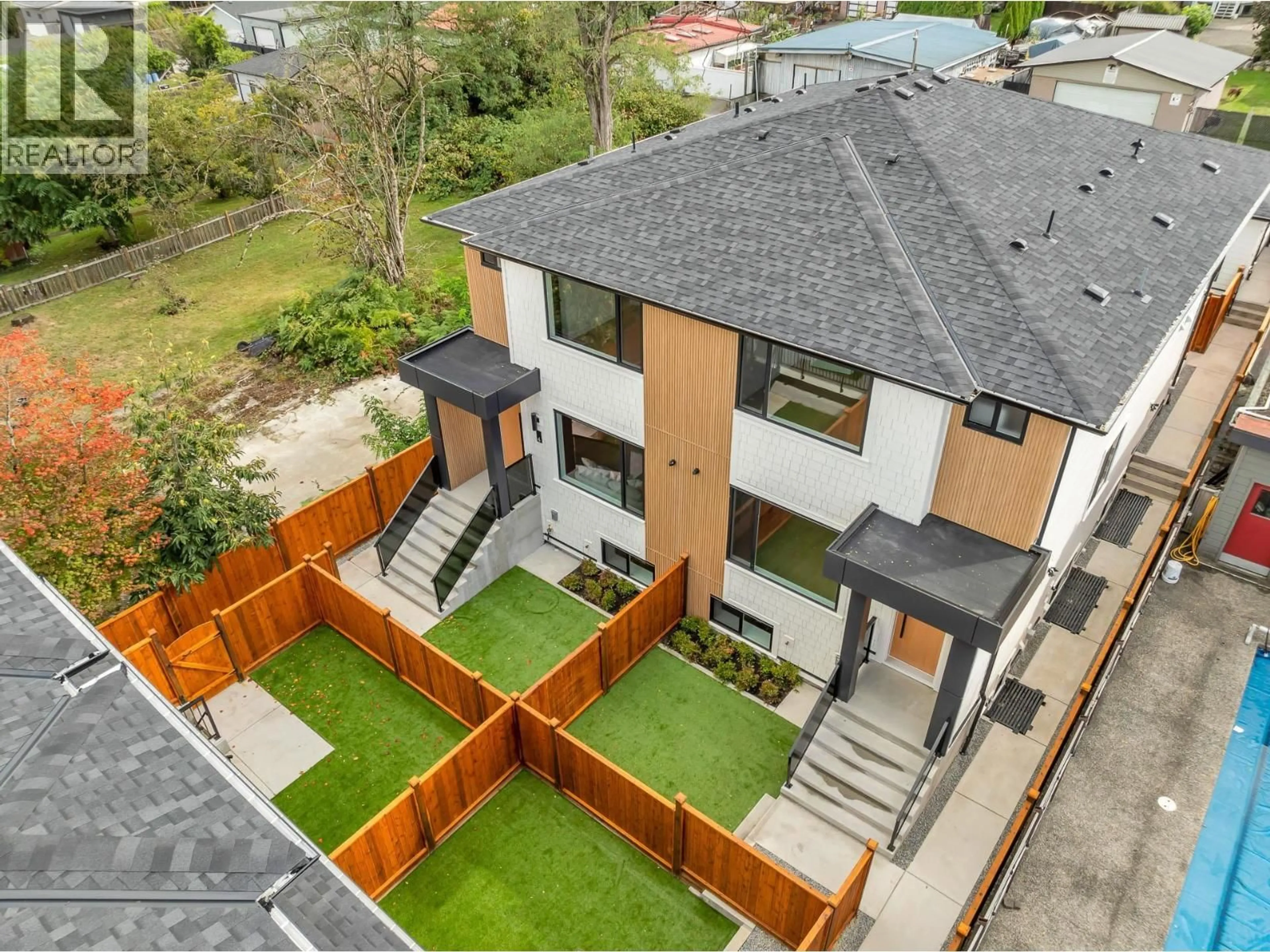 A pic from outside/outdoor area/front of a property/back of a property/a pic from drone, mountain view for 4 - 7750 MAYFIELD STREET, Burnaby British Columbia V5E2J6