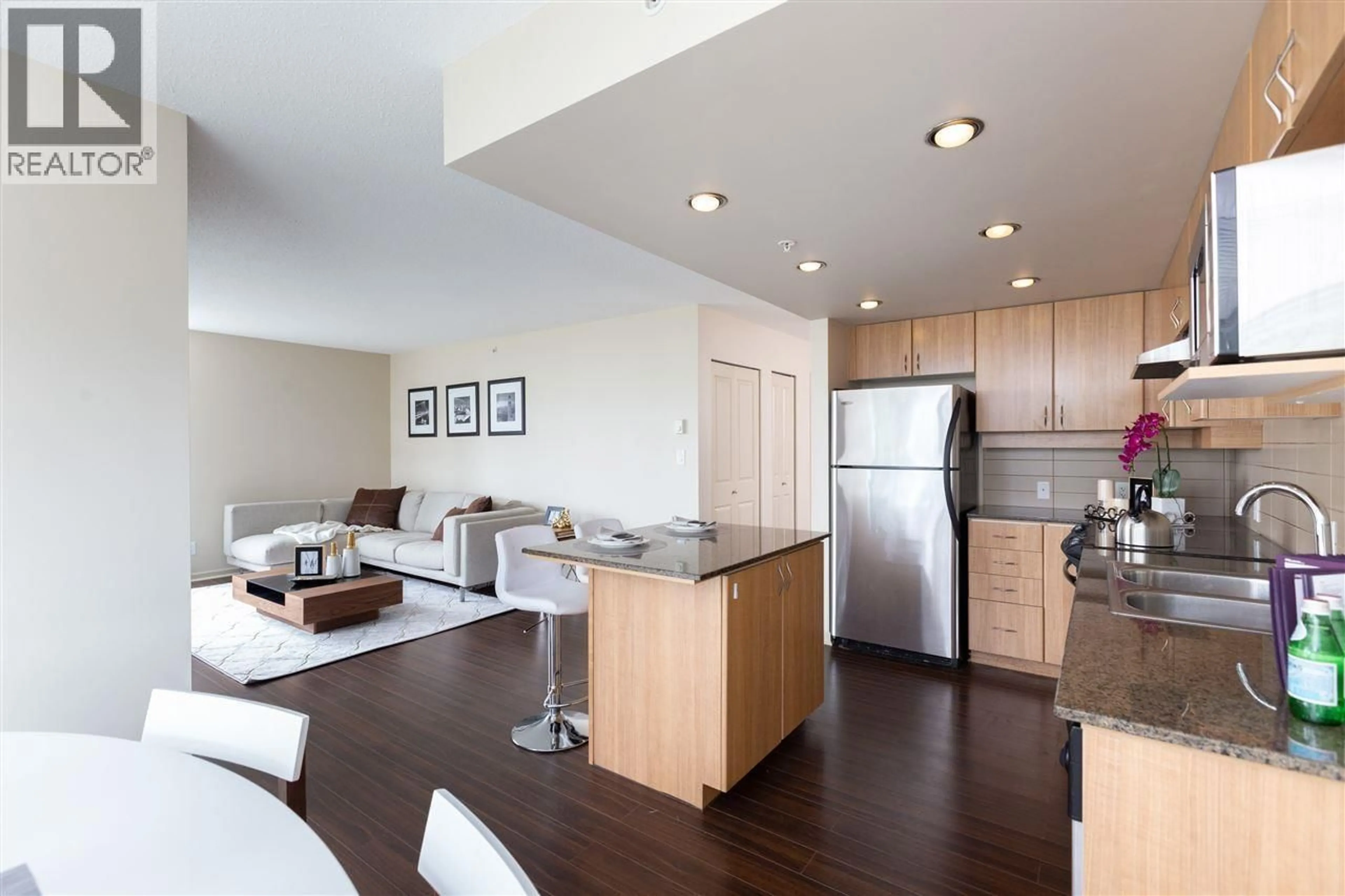 Open concept kitchen, wood/laminate floor for 305 - 9232 UNIVERSITY CRESCENT, Burnaby British Columbia V5A0A3