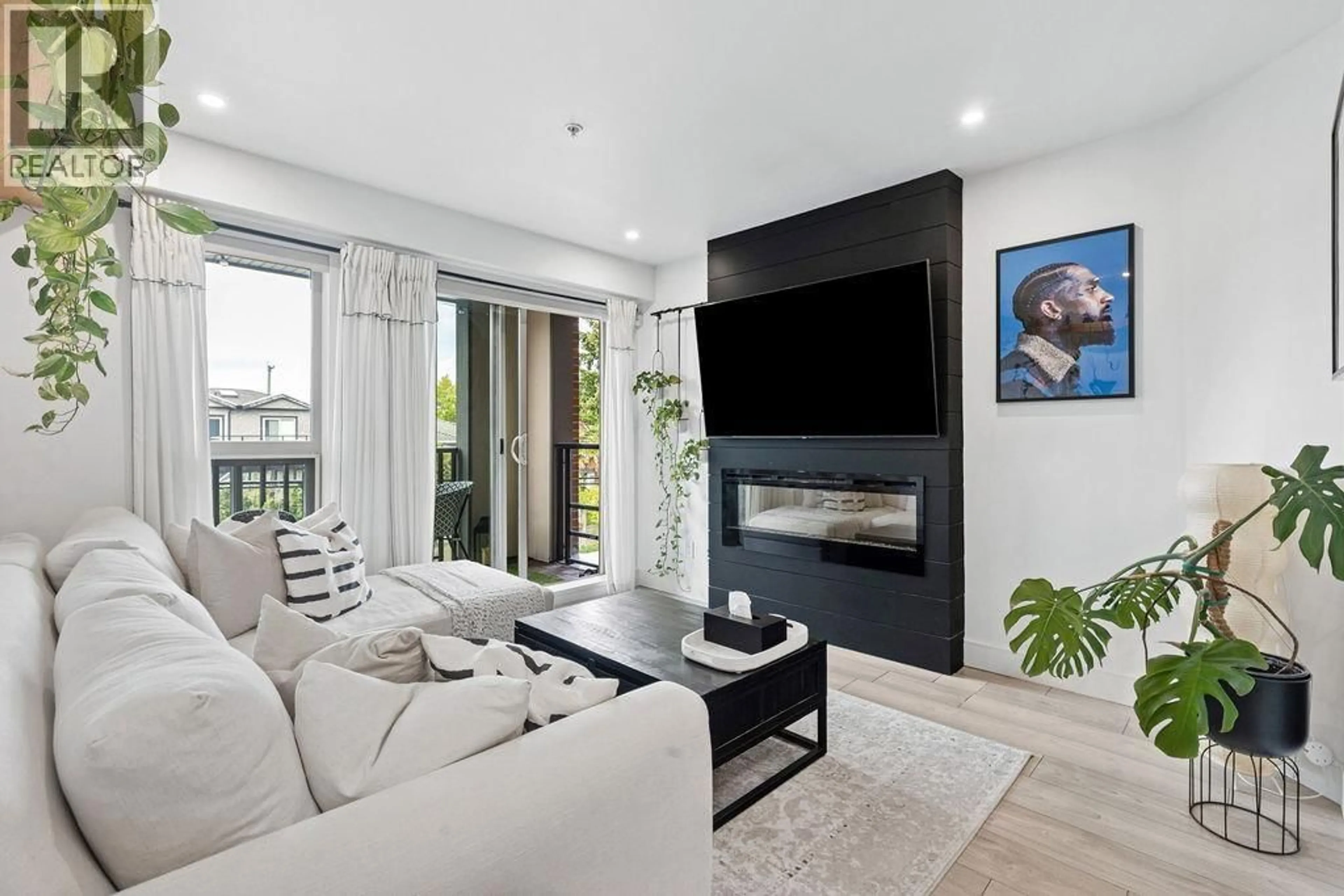 Living room with furniture, unknown for 232 - 4550 FRASER STREET, Vancouver British Columbia V5V4G8