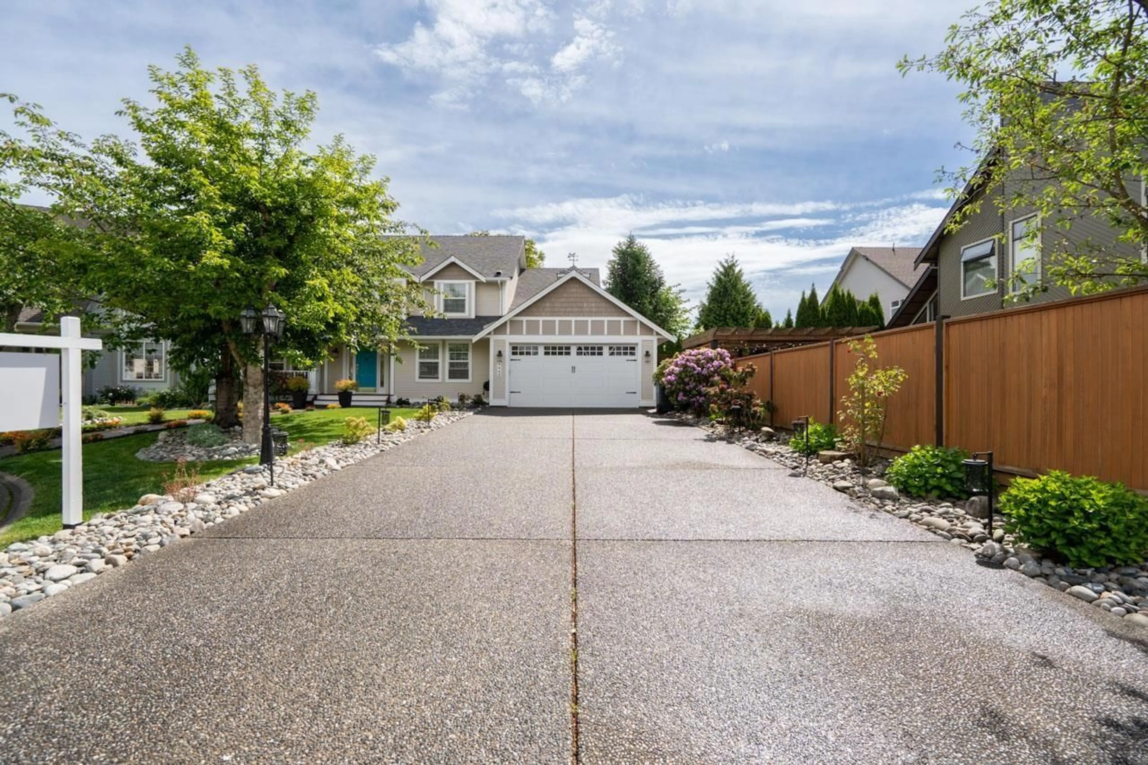 Home with vinyl exterior material, street for 4442 209B, Langley British Columbia V3A8Y8
