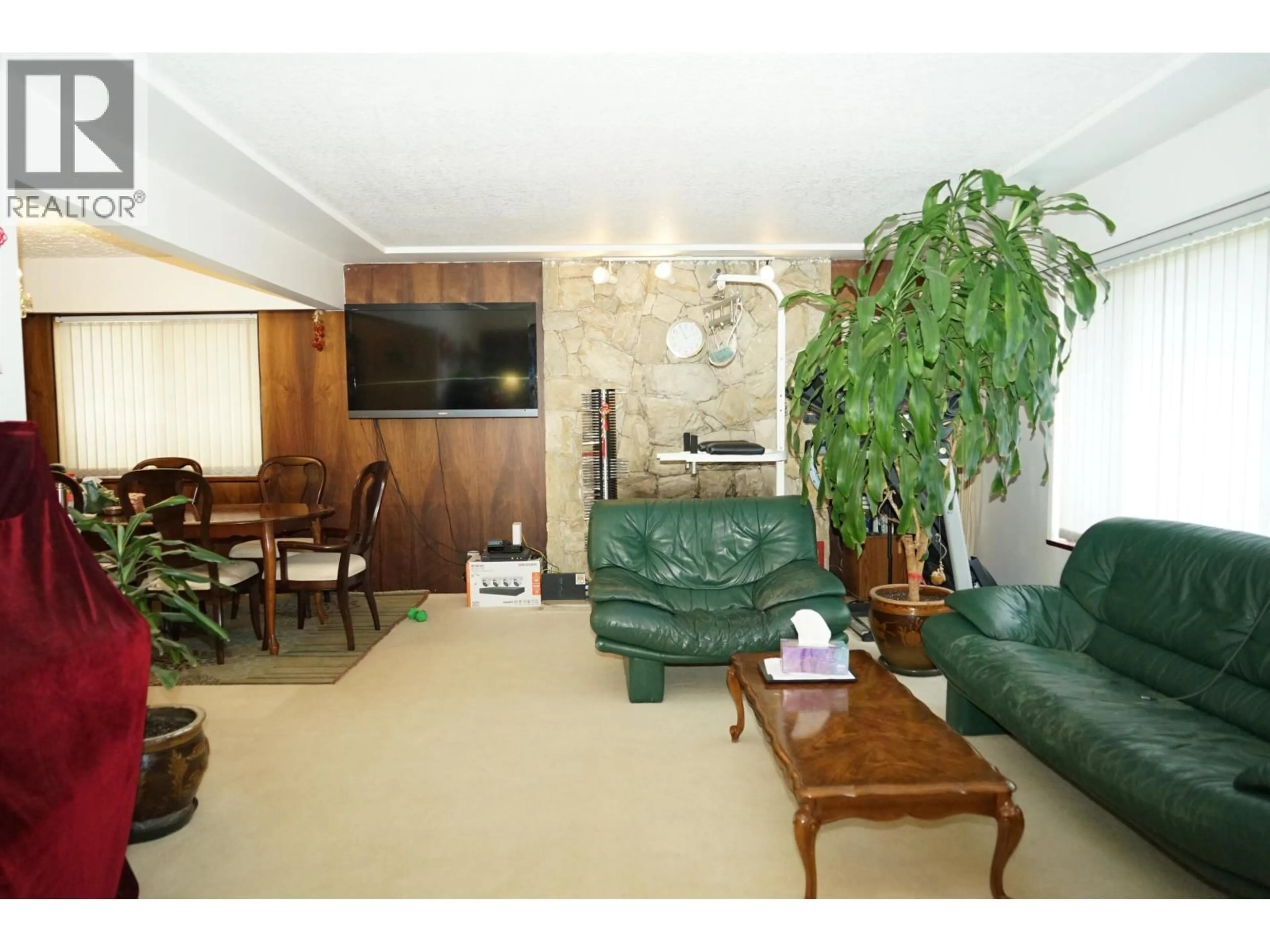 Living room with furniture, wood/laminate floor for 7008 CURTIS STREET, Burnaby British Columbia V5A1J6