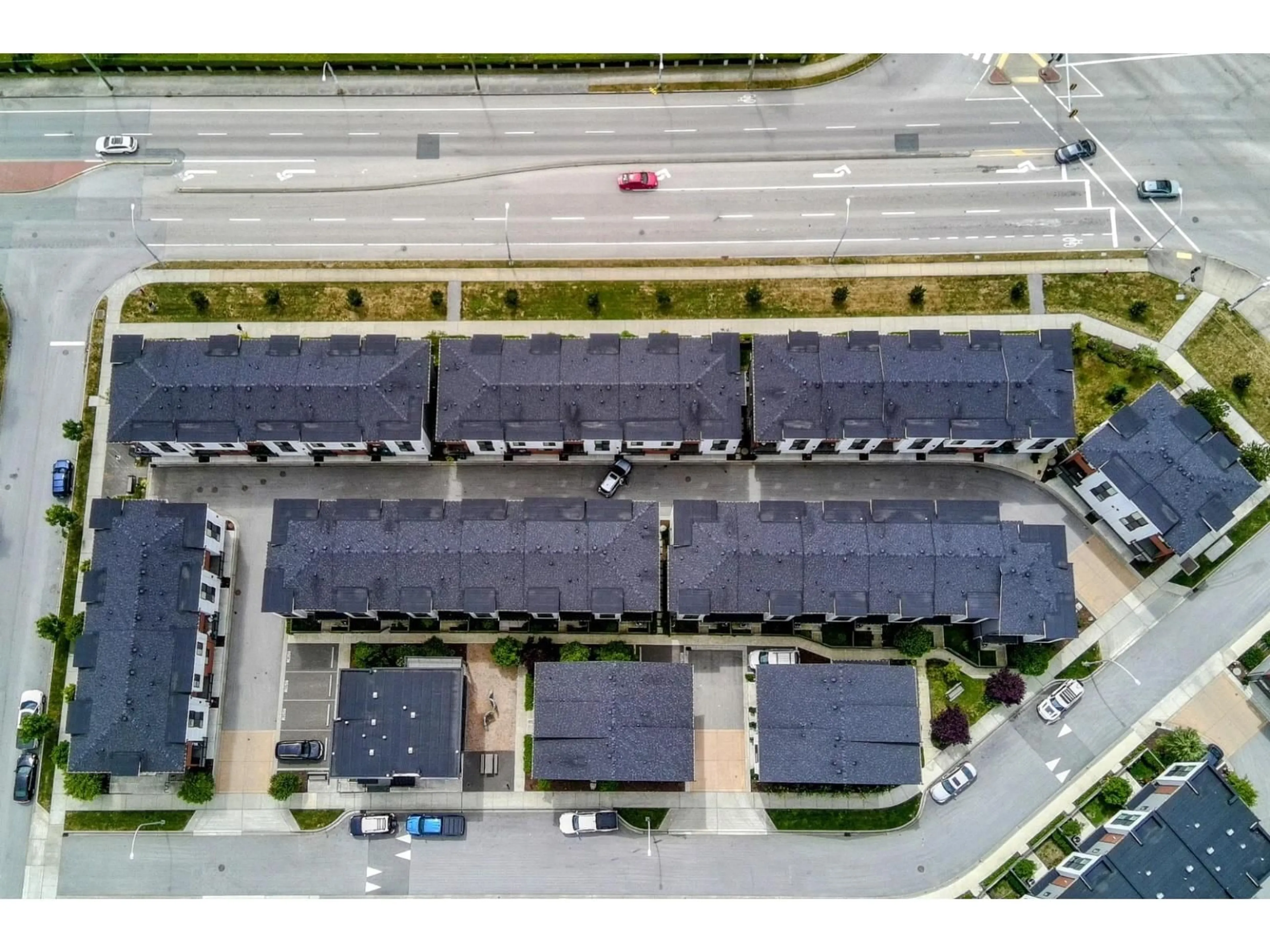 A pic from outside/outdoor area/front of a property/back of a property/a pic from drone, street for 10 - 1639 162, Surrey British Columbia V4A4Y1