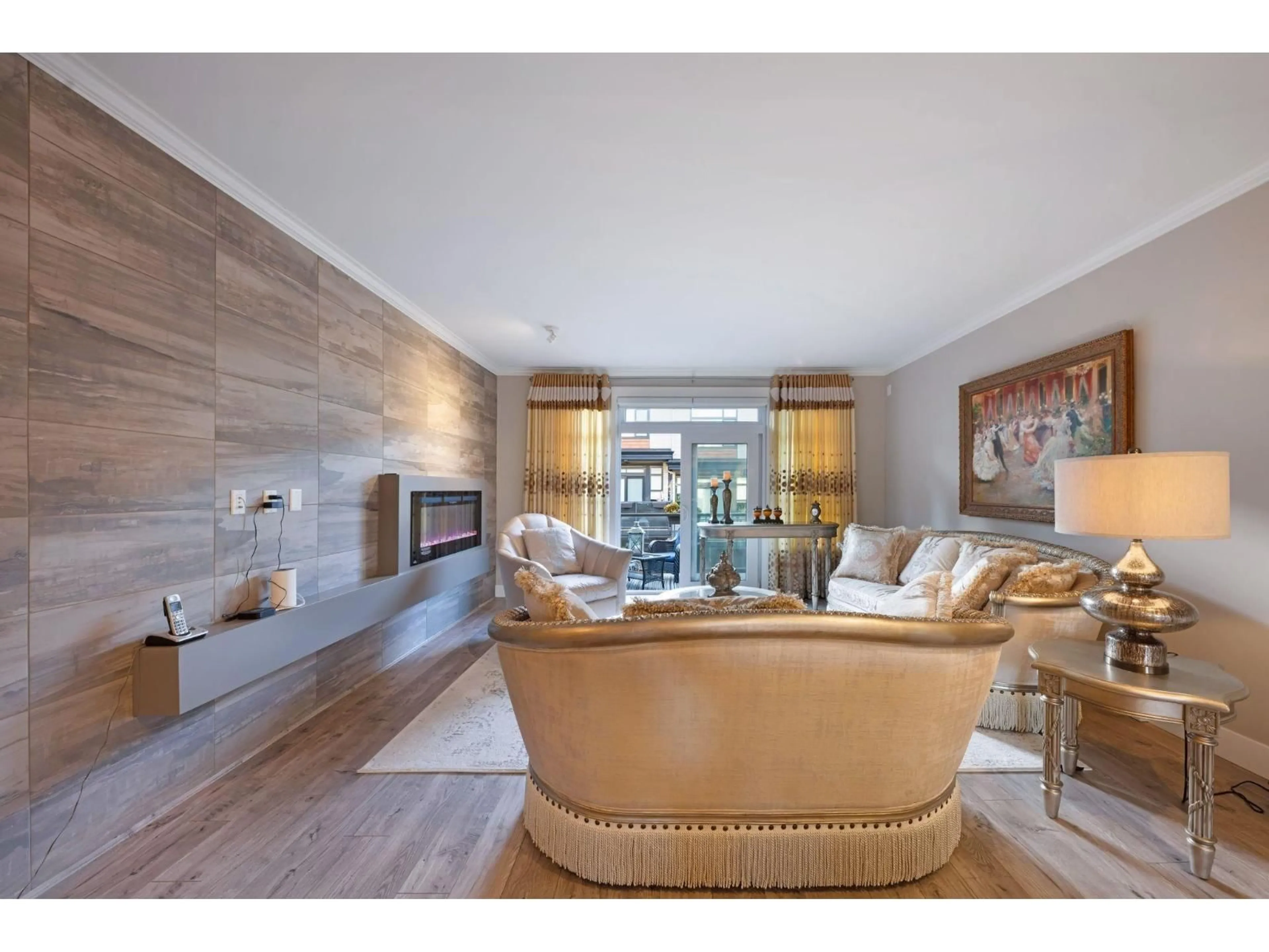 Living room with furniture, wood/laminate floor for 90 - 16488 64, Surrey British Columbia V3S6X6