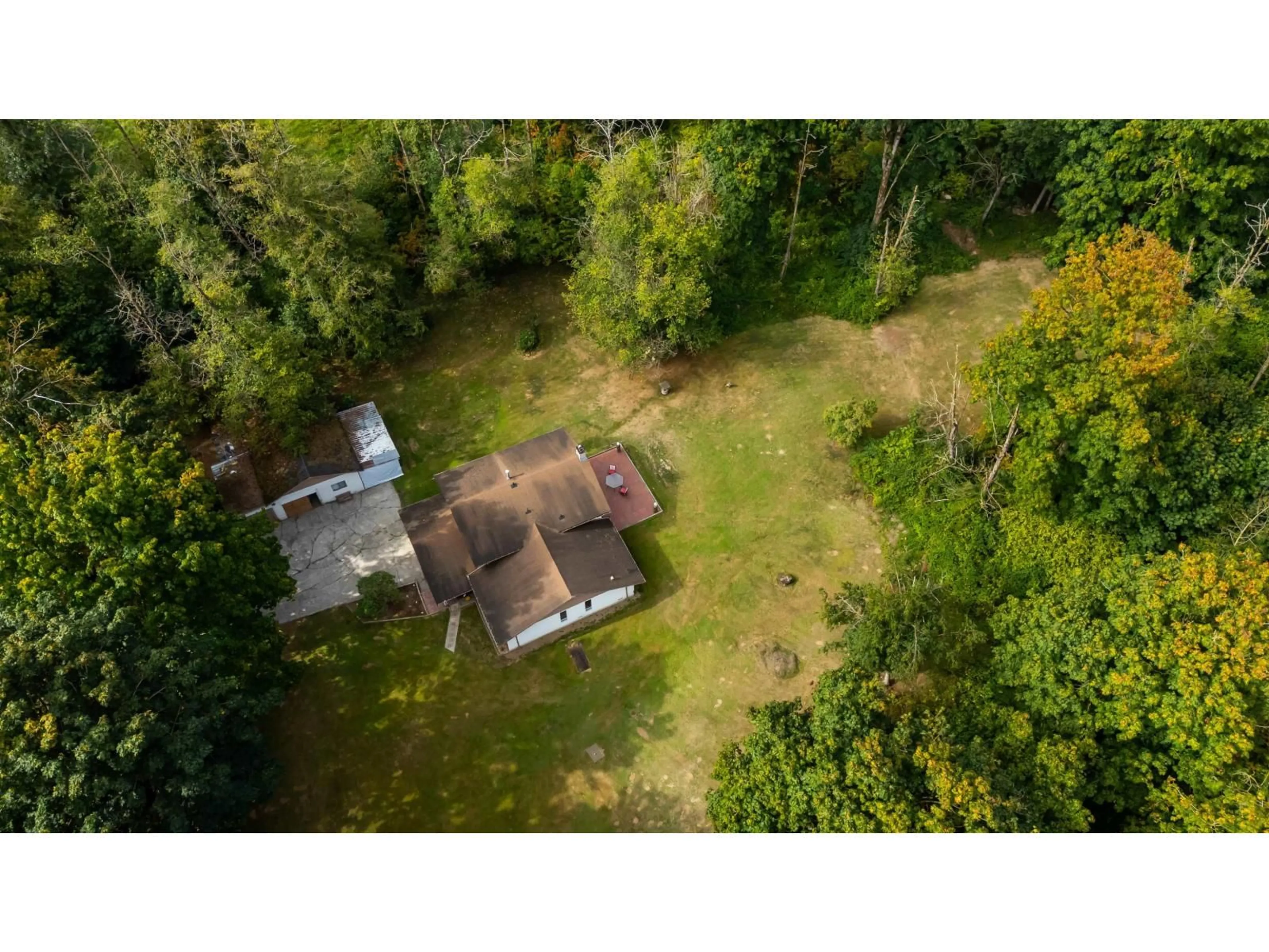 A pic from outside/outdoor area/front of a property/back of a property/a pic from drone, forest/trees view for 27355 12B, Langley British Columbia V4W2P7