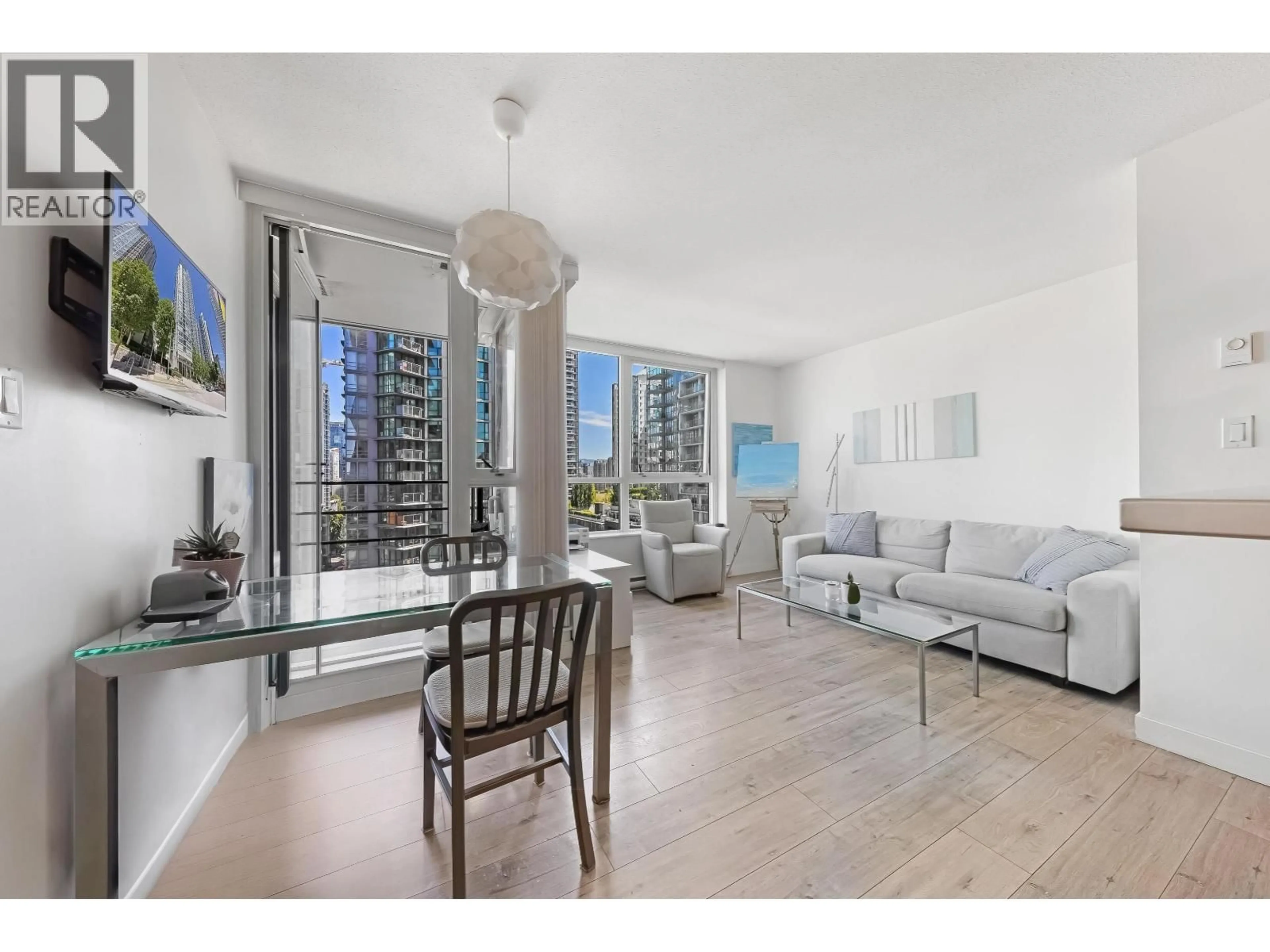 Living room with furniture, floor is not visible for 1607 - 1495 RICHARD STREET, Vancouver British Columbia V6Z3E3