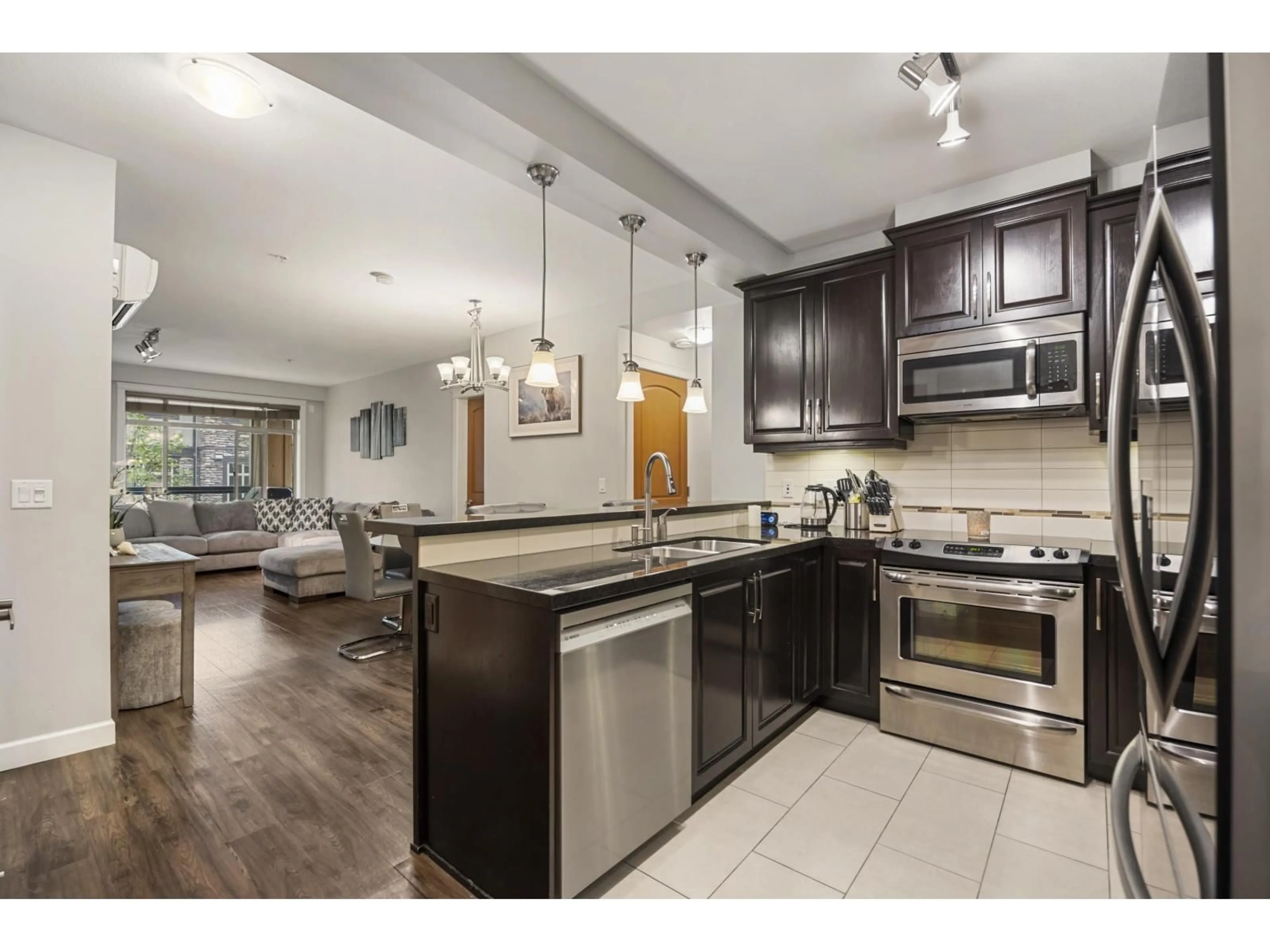 Open concept kitchen, unknown for 336 - 8288 207A, Langley British Columbia V2Y0L2