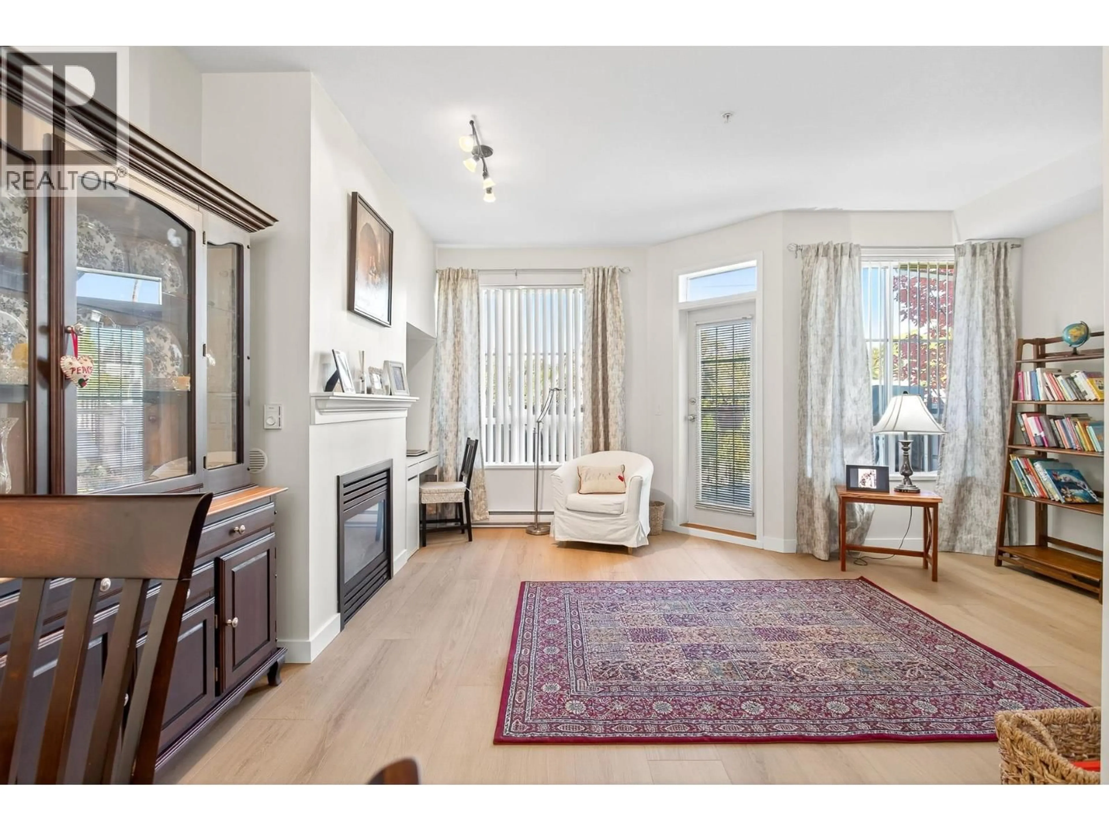 Living room with furniture, unknown for 201 - 815 FIRST STREET, New Westminster British Columbia V3L2H7