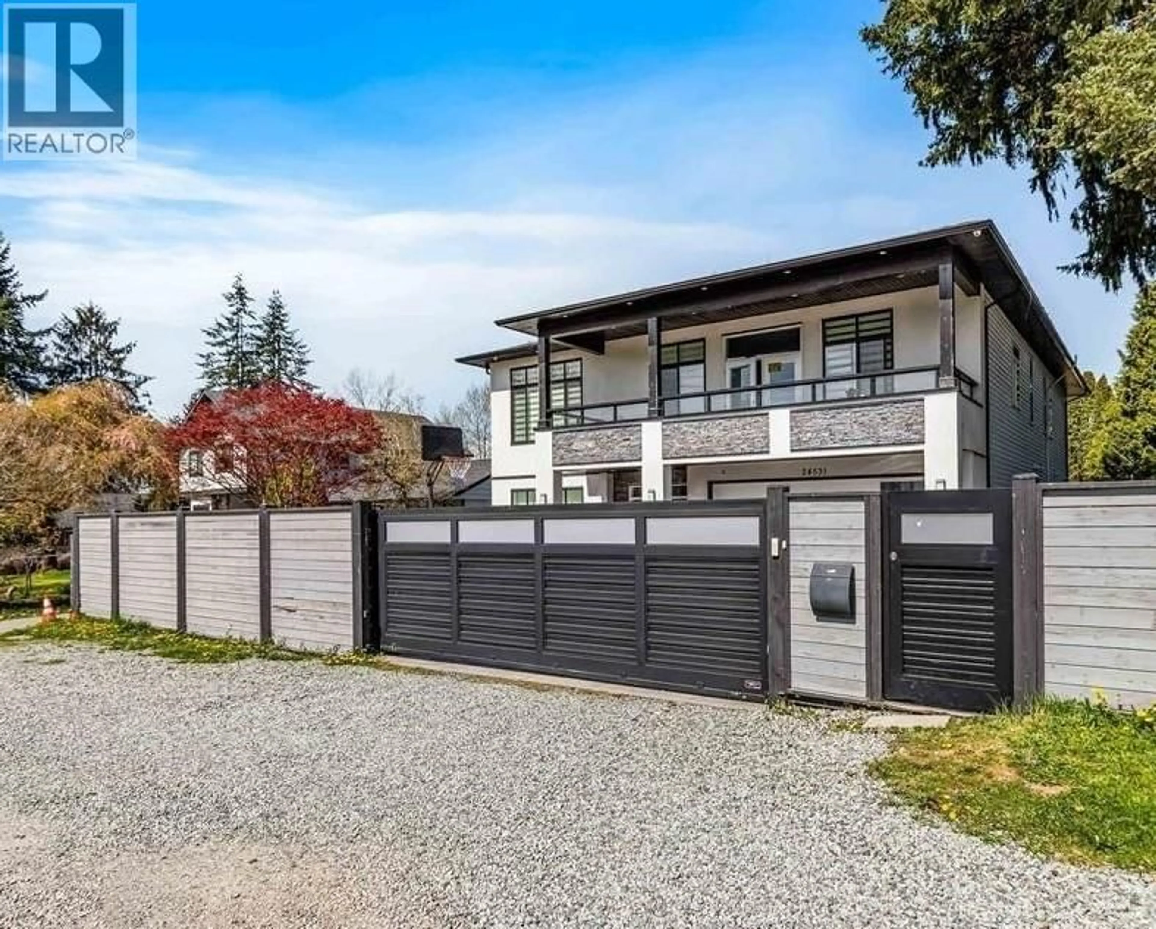 Home with vinyl exterior material, street for 24531 DEWDNEY TRUNK ROAD, Maple Ridge British Columbia V4R1W9