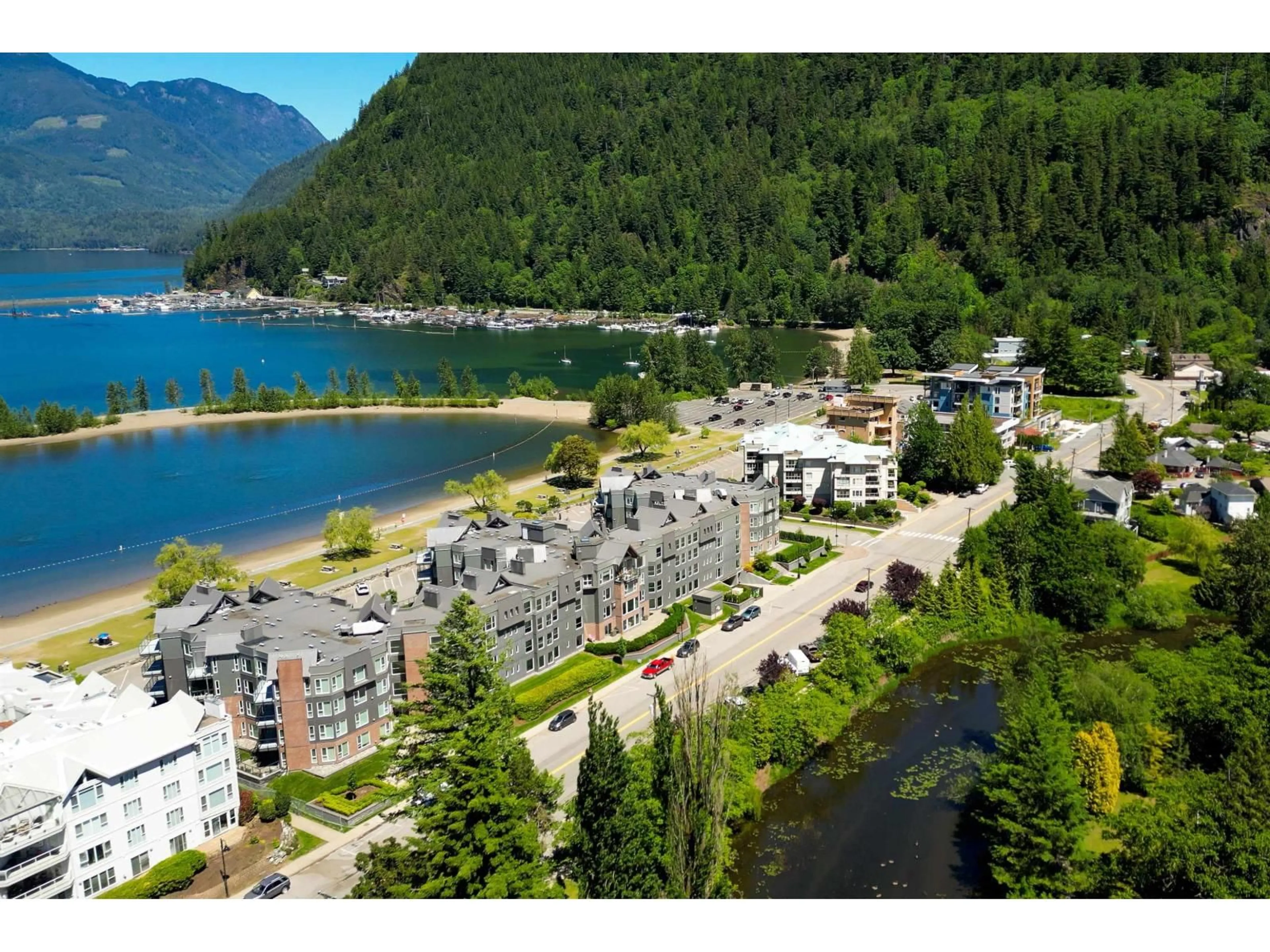 A pic from outside/outdoor area/front of a property/back of a property/a pic from drone, water/lake/river/ocean view for 317 - 378 ESPLANADE AVENUE, Harrison Hot Springs British Columbia V0M1K0
