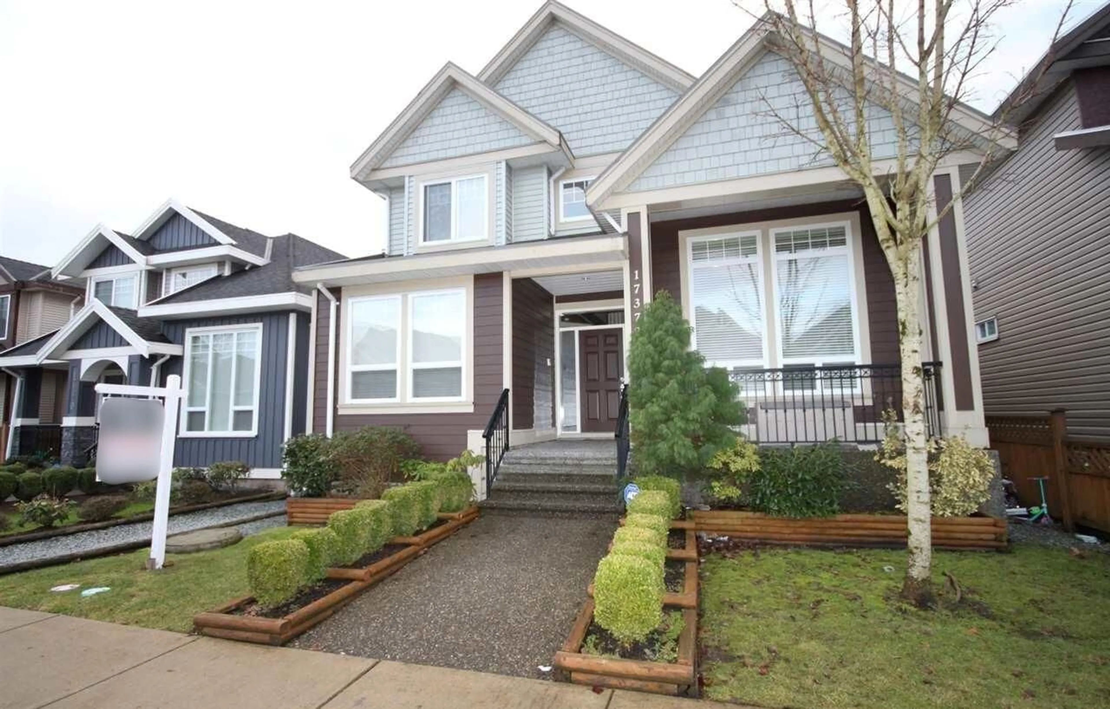 Home with vinyl exterior material, street for 17372 64A, Surrey British Columbia V3S2H8