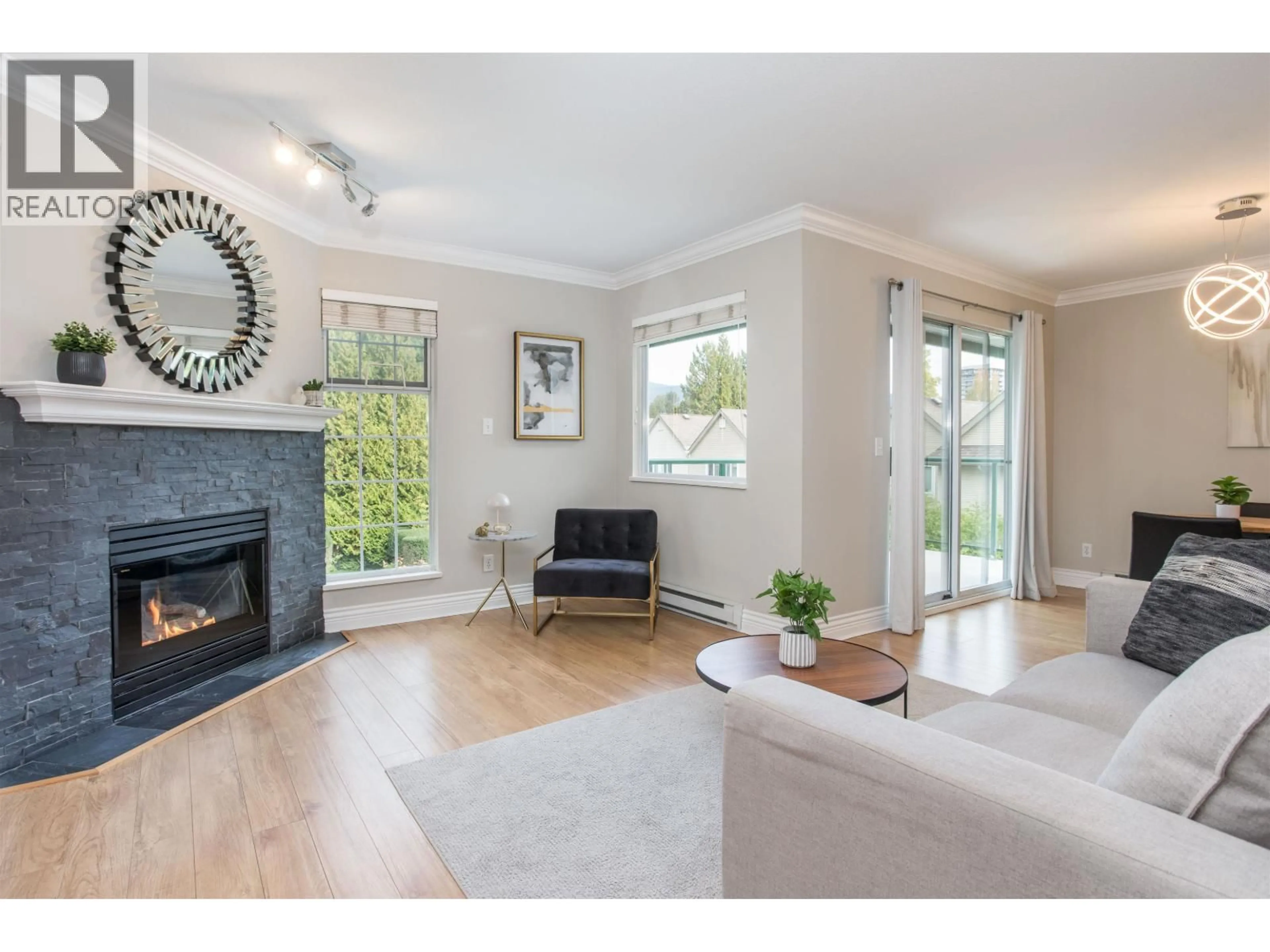 Living room with furniture, wood/laminate floor for 309 - 1155 DUFFERIN STREET, Coquitlam British Columbia V3B7K2