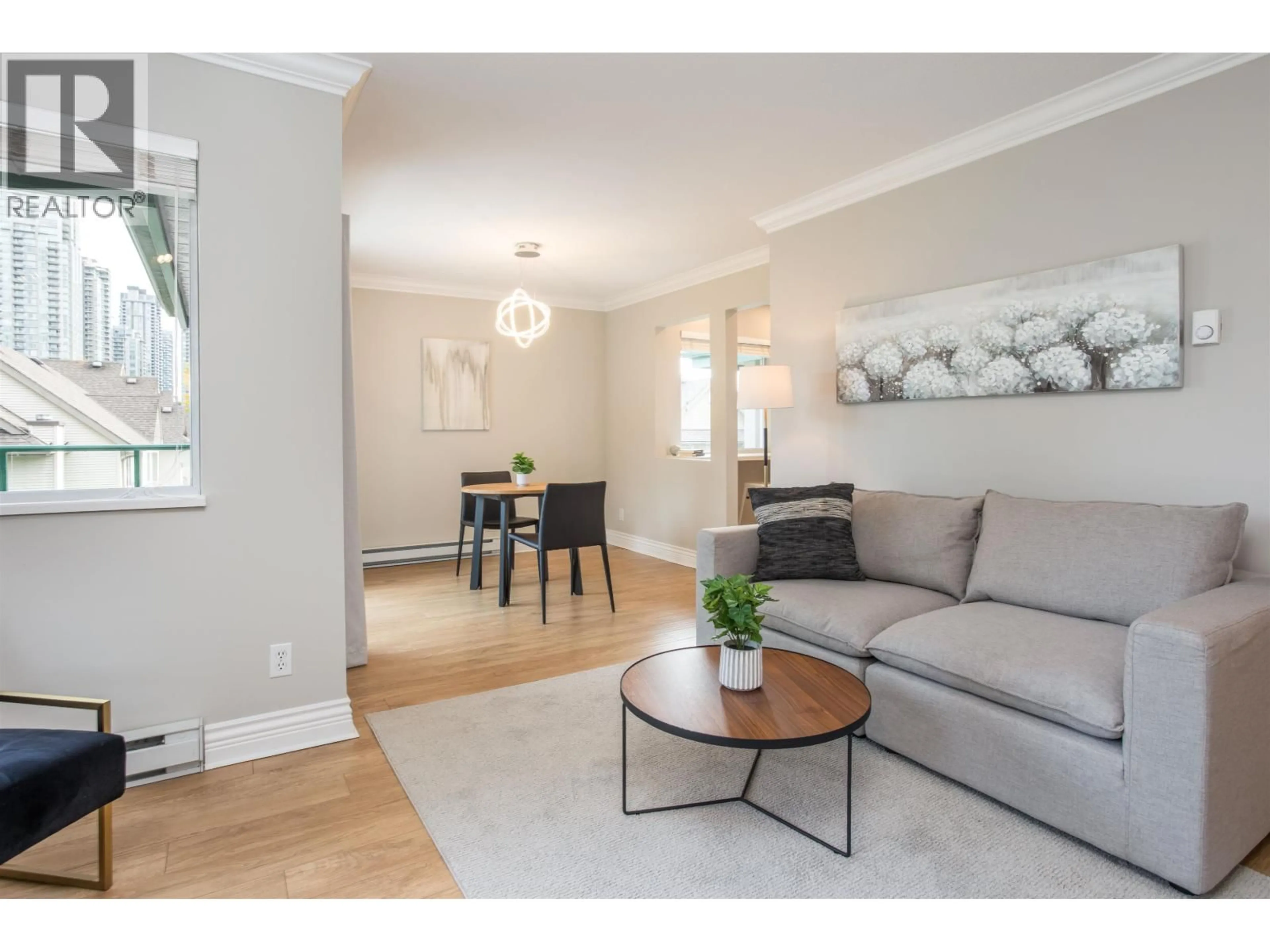 Living room with furniture, wood/laminate floor for 309 - 1155 DUFFERIN STREET, Coquitlam British Columbia V3B7K2