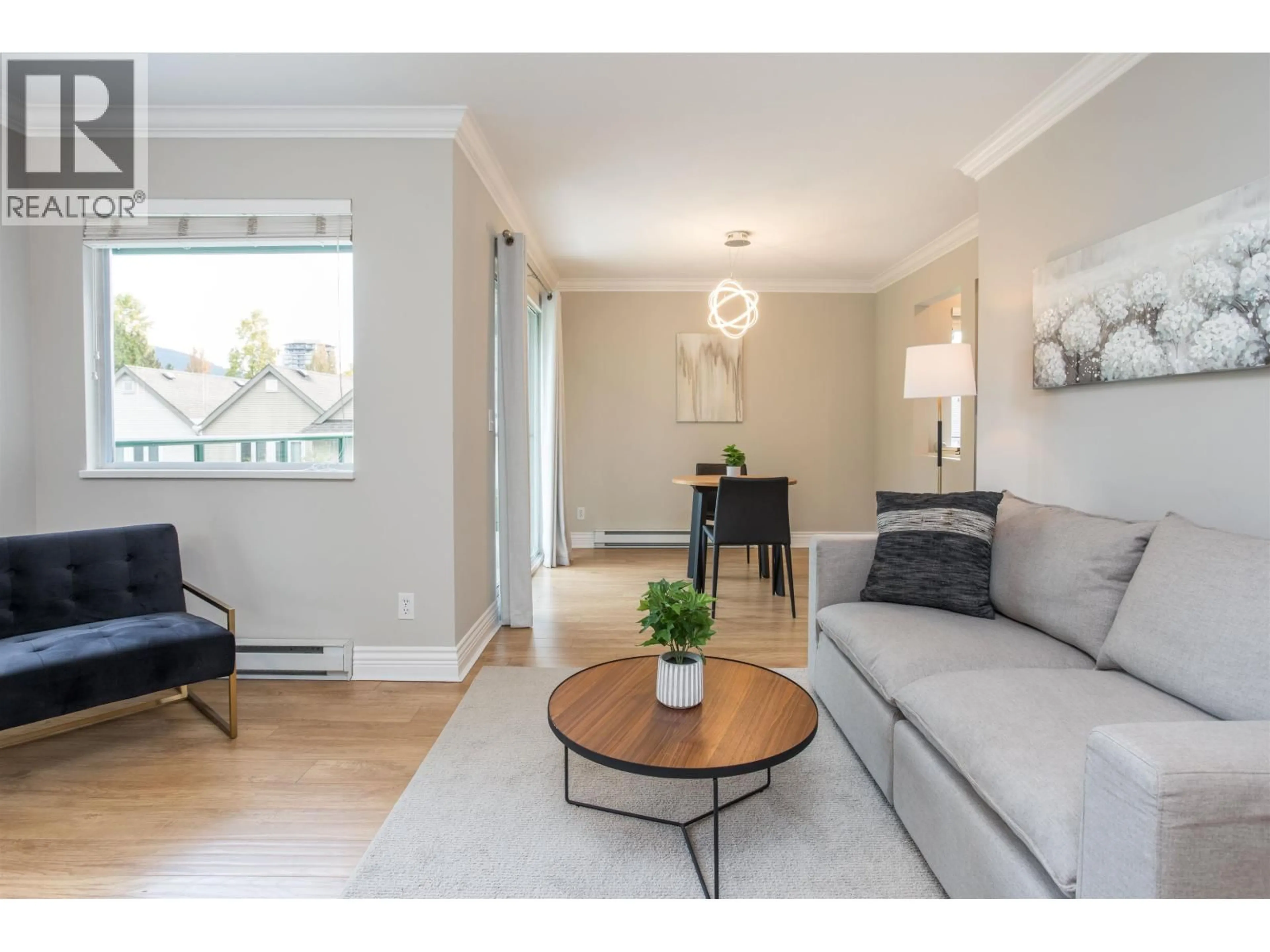 Living room with furniture, wood/laminate floor for 309 - 1155 DUFFERIN STREET, Coquitlam British Columbia V3B7K2