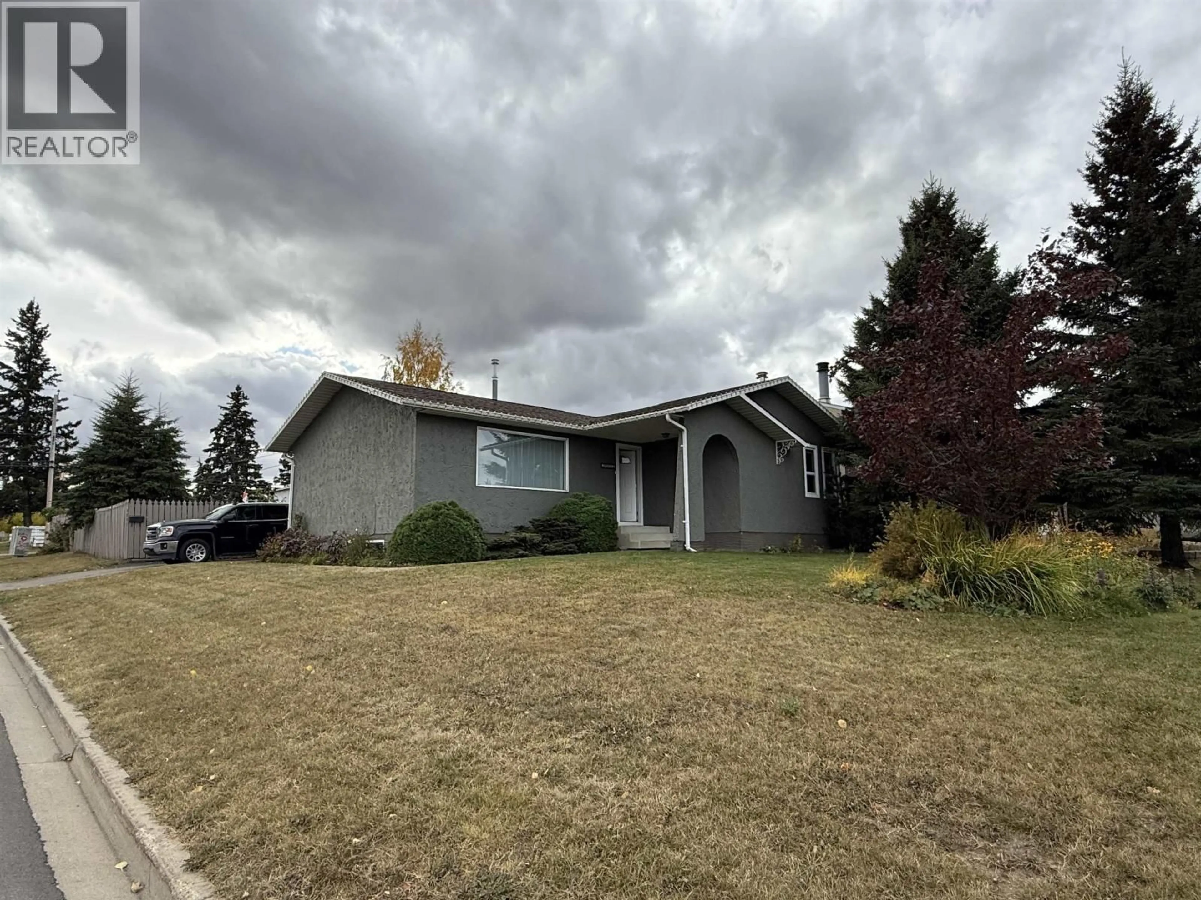 Home with vinyl exterior material, street for 9803 113 AVENUE, Fort St. John British Columbia V1J4P7
