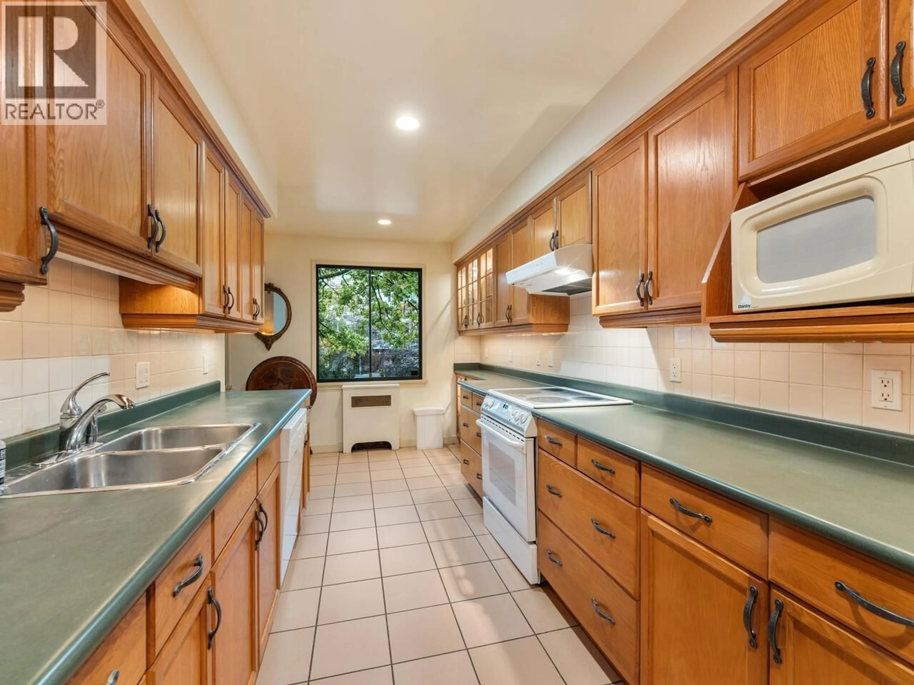Standard kitchen, ceramic/tile floor for 201 - 1695 W 10TH AVENUE, Vancouver British Columbia V6J2A2