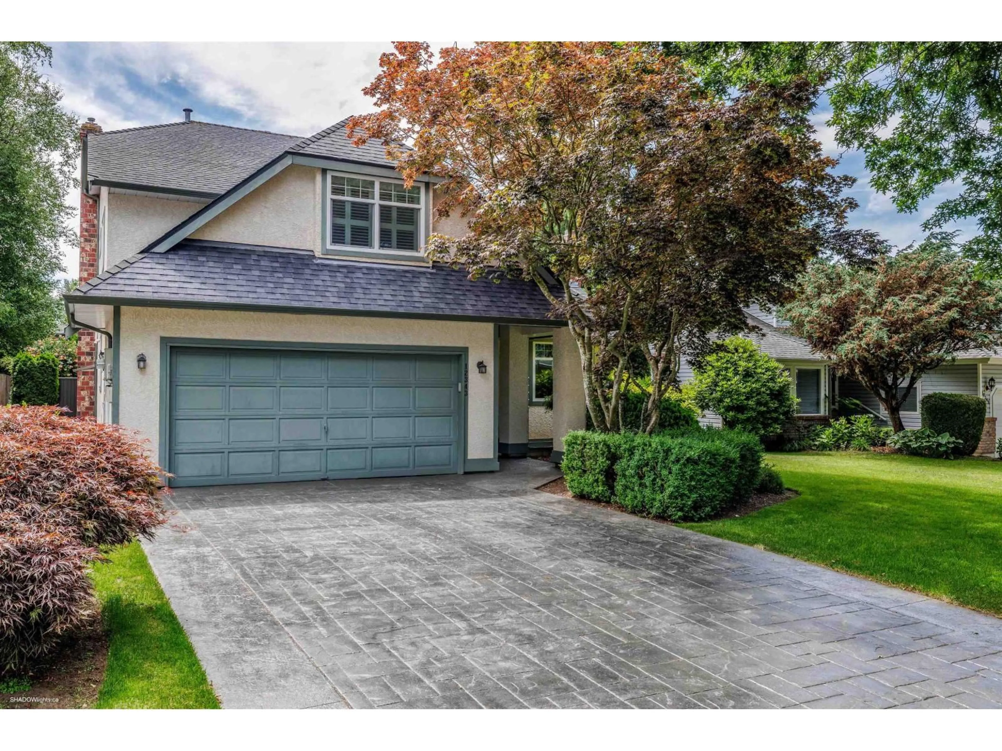 Home with vinyl exterior material, street for 12343 NORTHPARK, Surrey British Columbia V3X2A9