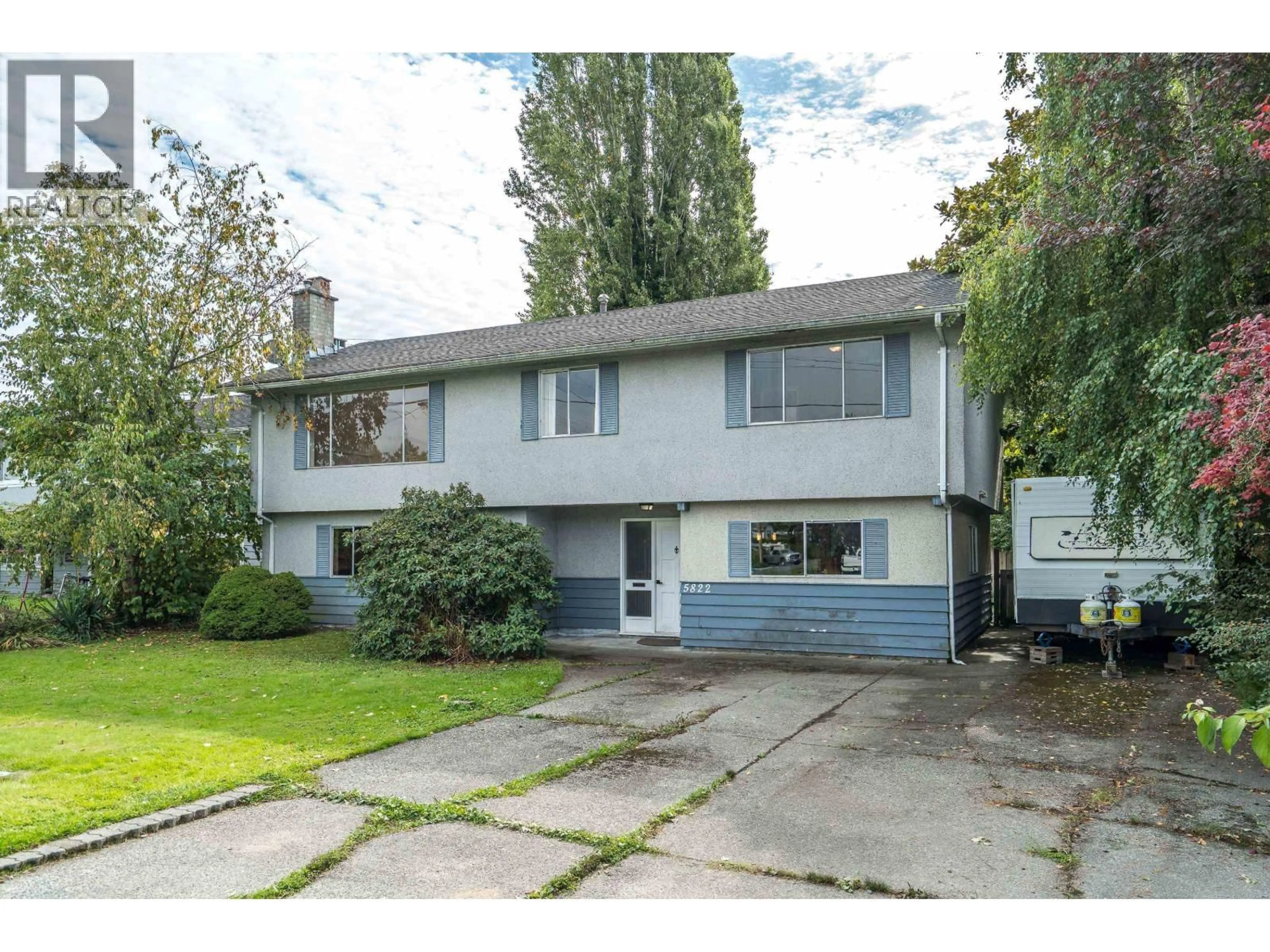 Home with vinyl exterior material, street for 5822 51 AVENUE, Ladner British Columbia V4K2C1