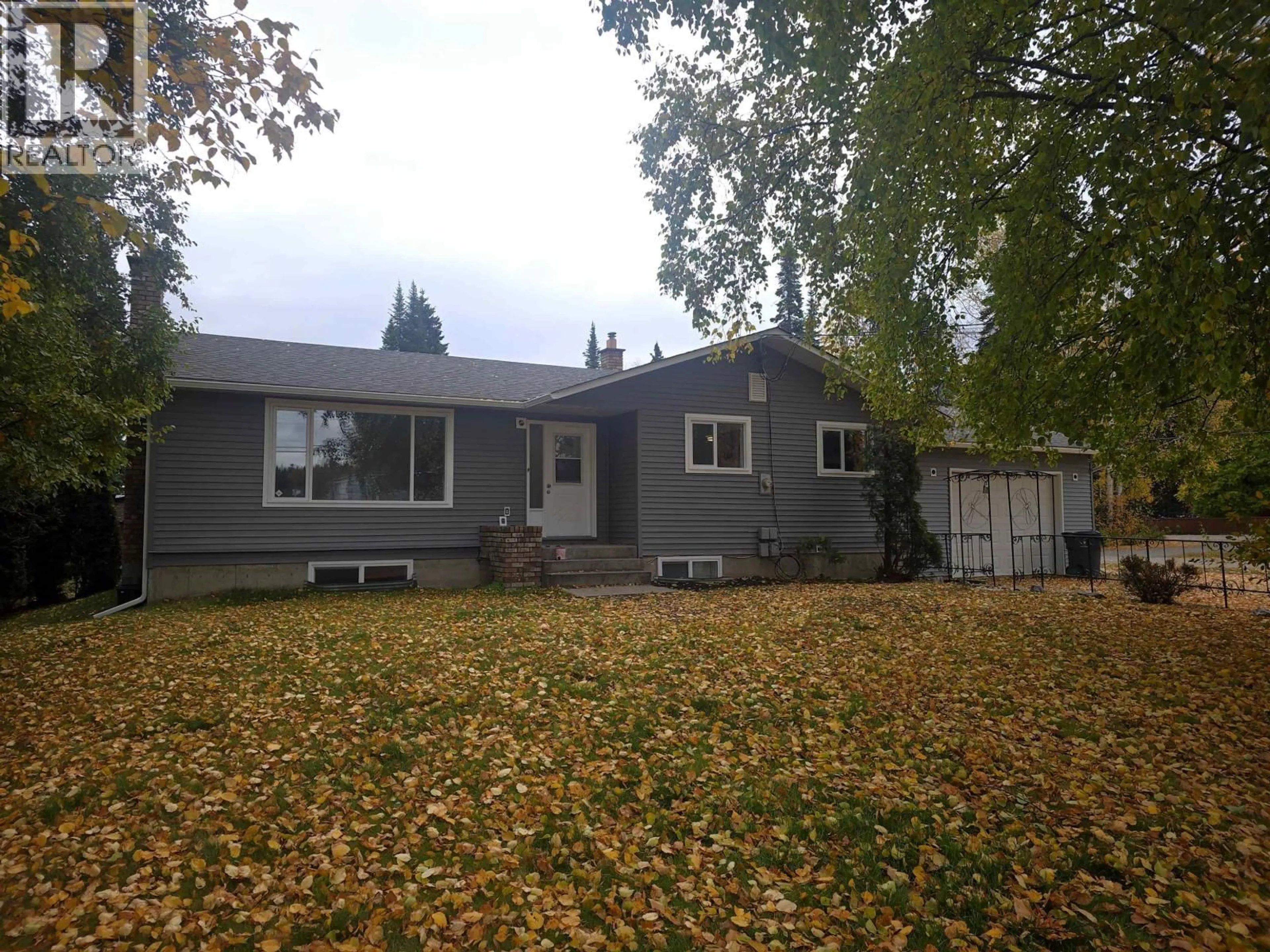 Home with vinyl exterior material, street for 7100 KELLY ROAD, Prince George British Columbia V2K2H2