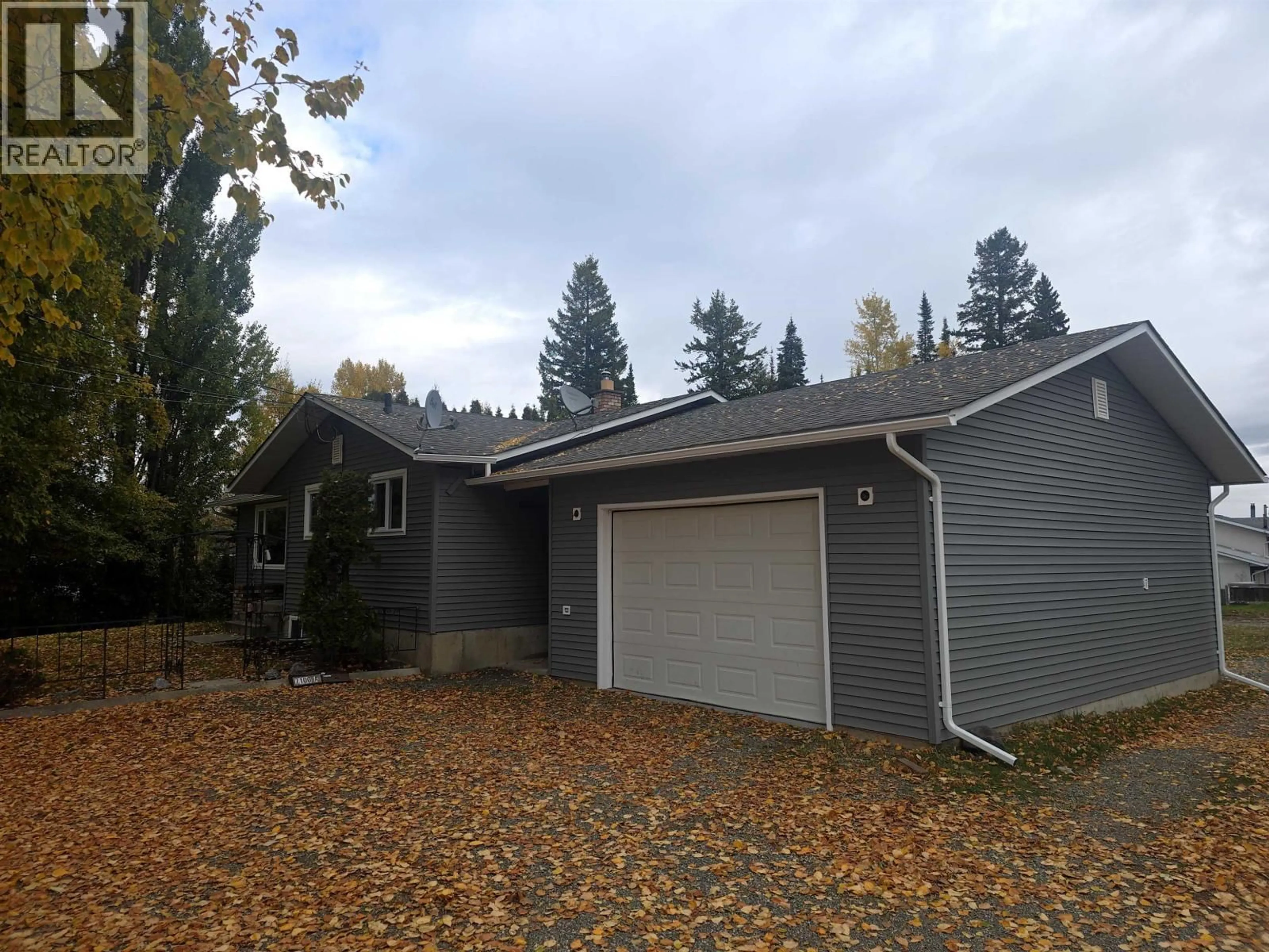 Home with vinyl exterior material, street for 7100 KELLY ROAD, Prince George British Columbia V2K2H2