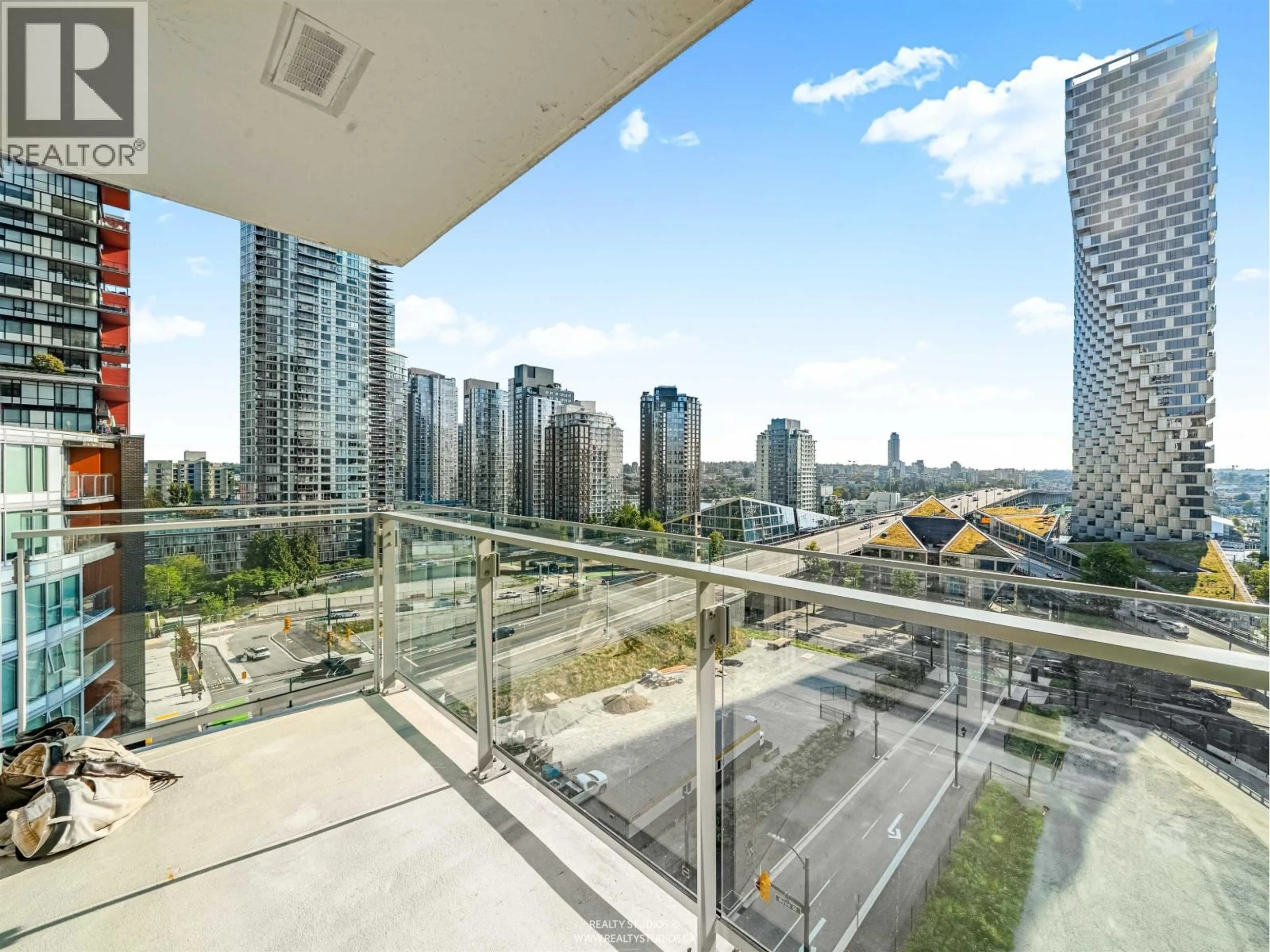 Balcony in the apartment, city buildings view from balcony for 1107 - 1351 CONTINENTAL STREET, Vancouver British Columbia V6Z0C6