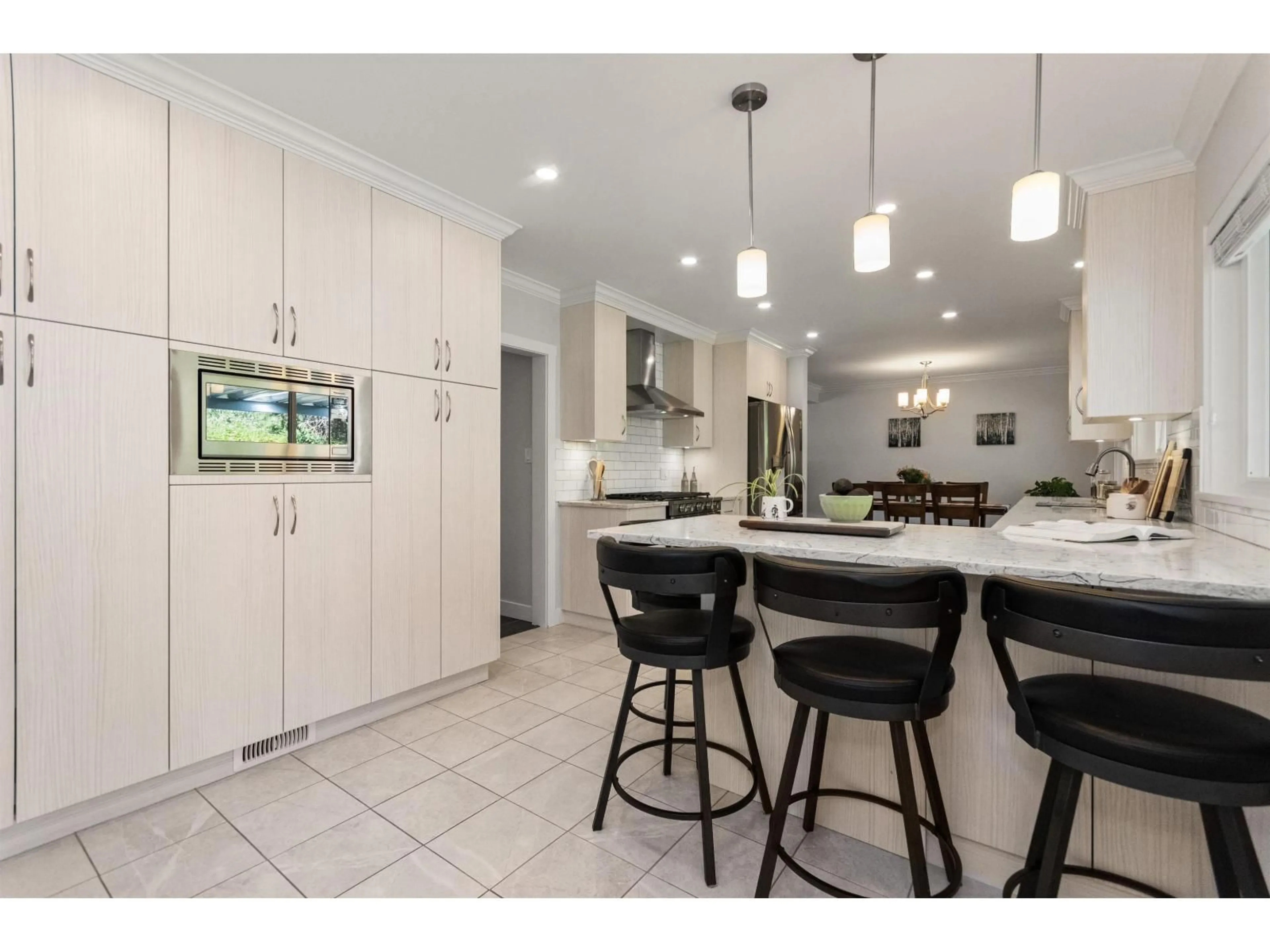 Open concept kitchen, ceramic/tile floor for 10070 BONAVISTA STREET, Chilliwack British Columbia V2P5B9