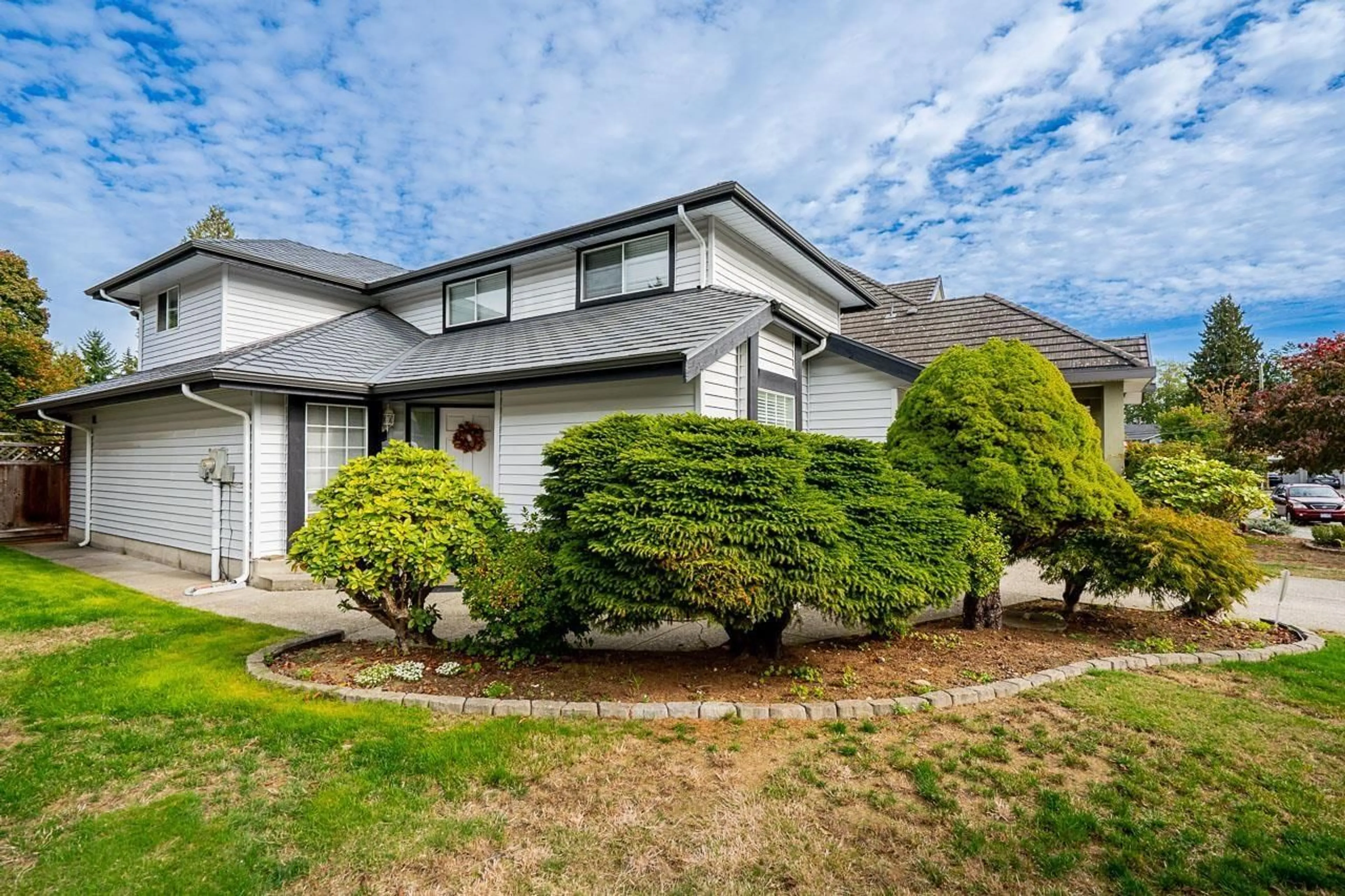 A pic from outside/outdoor area/front of a property/back of a property/a pic from drone, unknown for 12971 66B, Surrey British Columbia V3W9P2