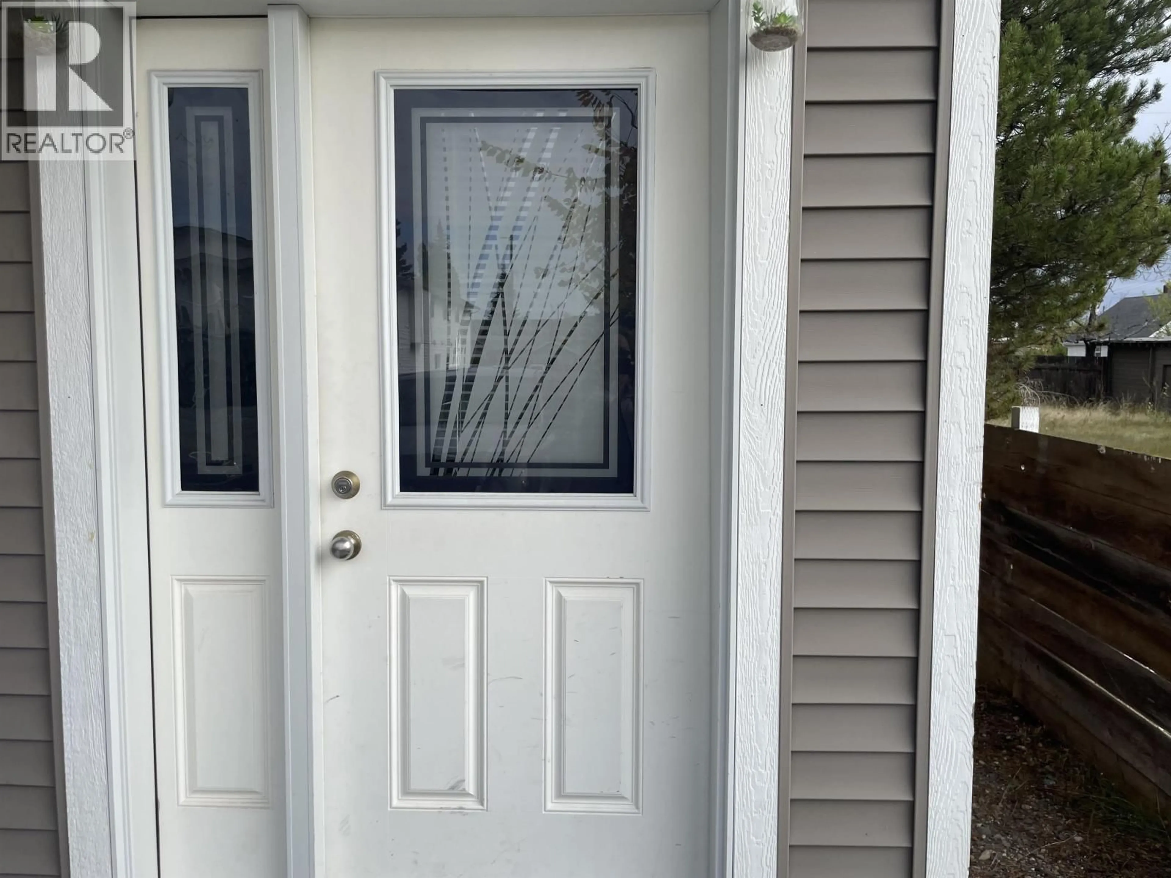 Home with vinyl exterior material, street for 596 HARPER STREET, Prince George British Columbia V2M2W5