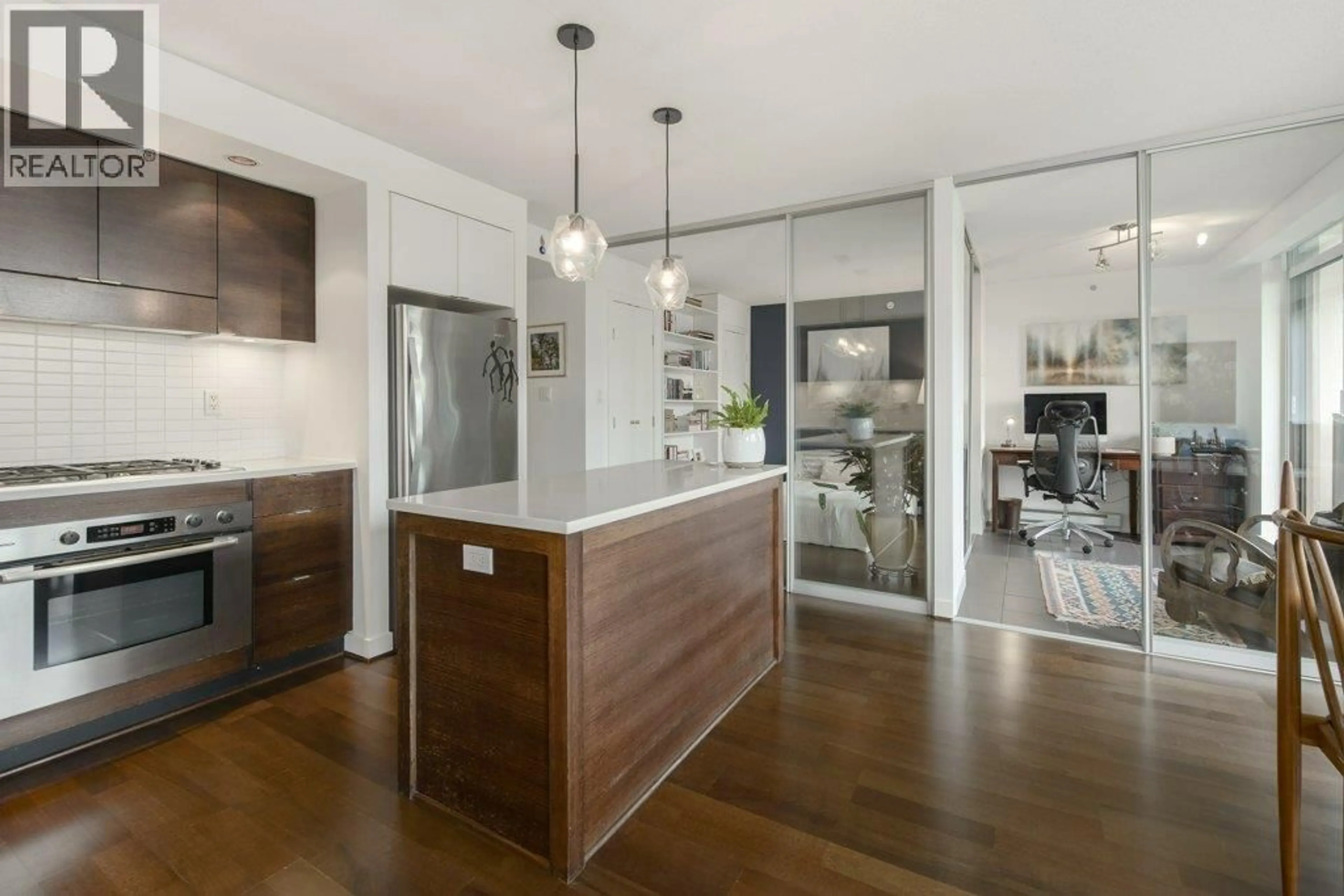 Open concept kitchen, wood/laminate floor for 503 - 1055 HOMER STREET, Vancouver British Columbia V6B1G3