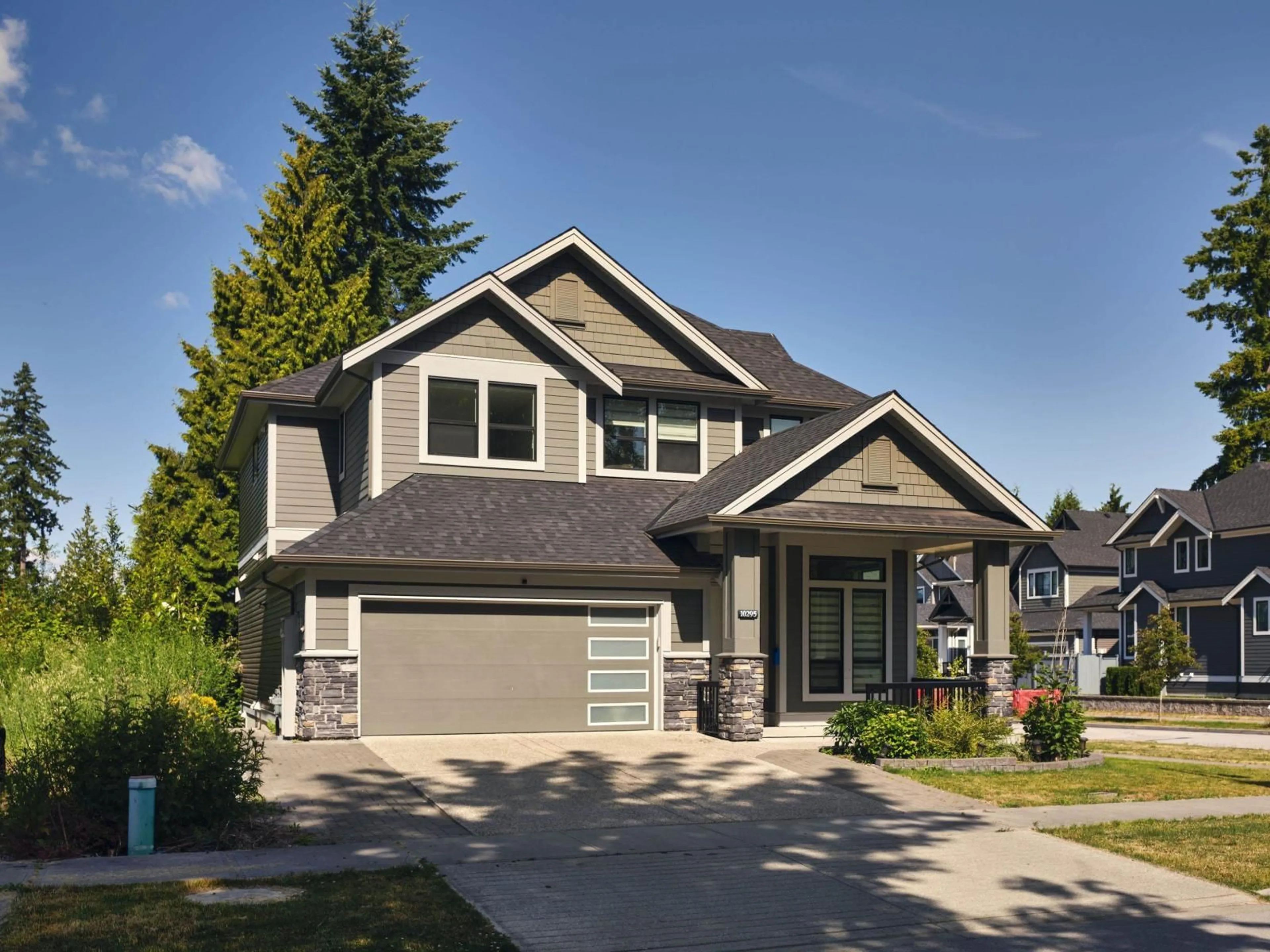 Home with vinyl exterior material, street for 10295 166B, Surrey British Columbia V4N6V4