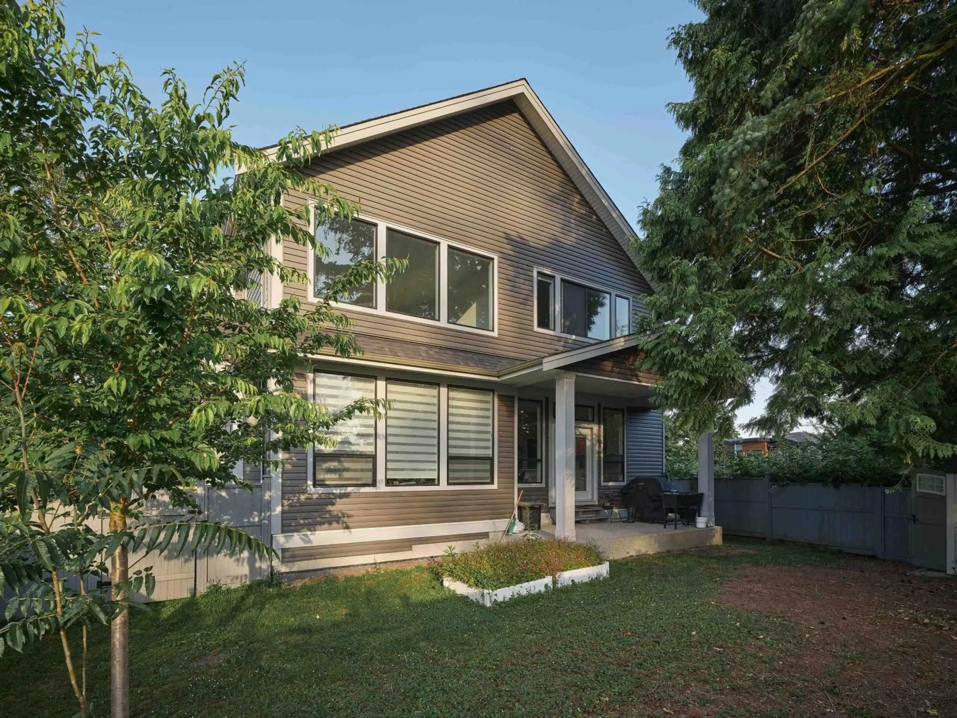 Home with vinyl exterior material, street for 10295 166B, Surrey British Columbia V4N6V4