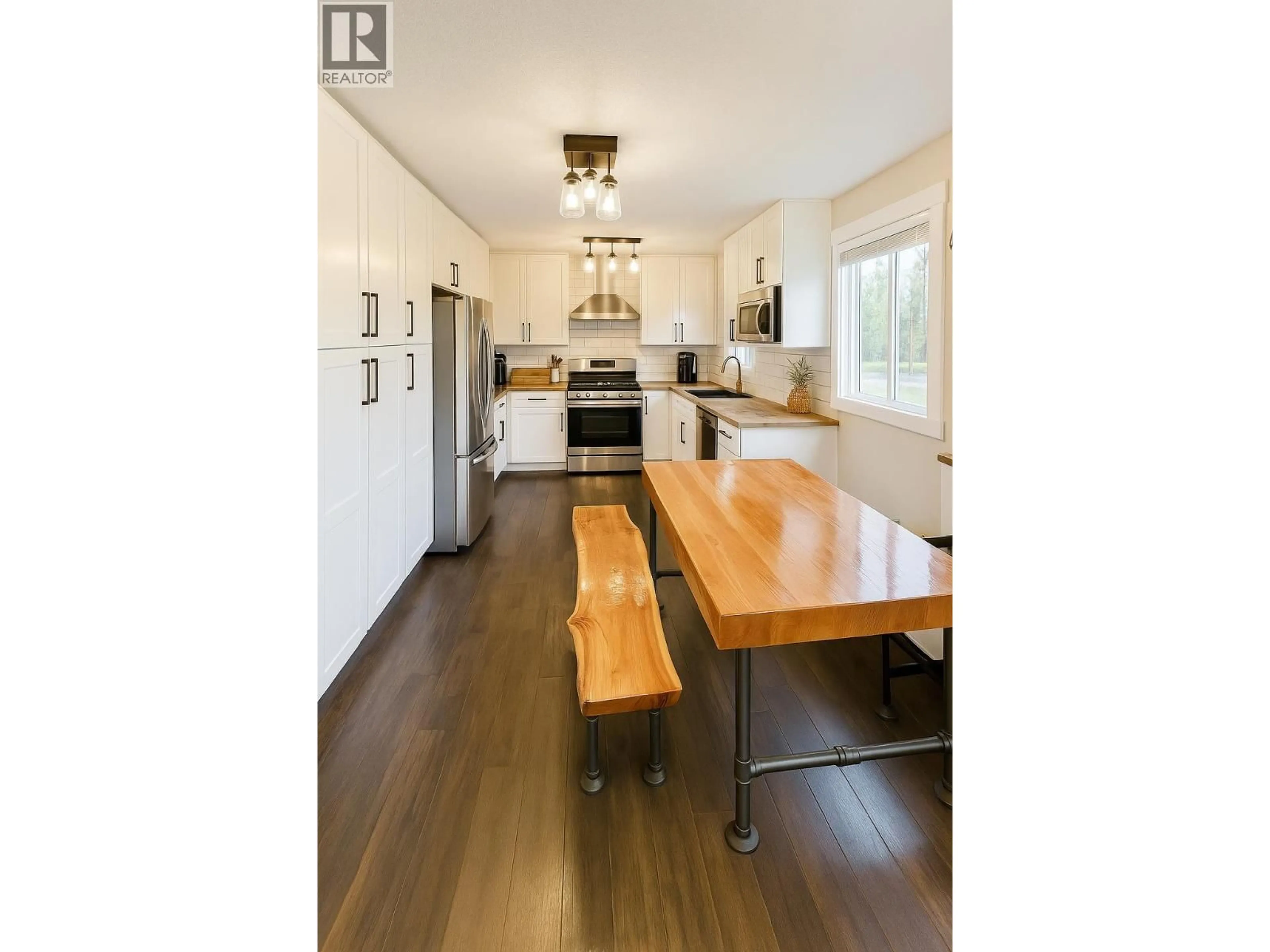 Open concept kitchen, wood/laminate floor for 6353 NORTH NECHAKO ROAD, Prince George British Columbia V2K4Z2