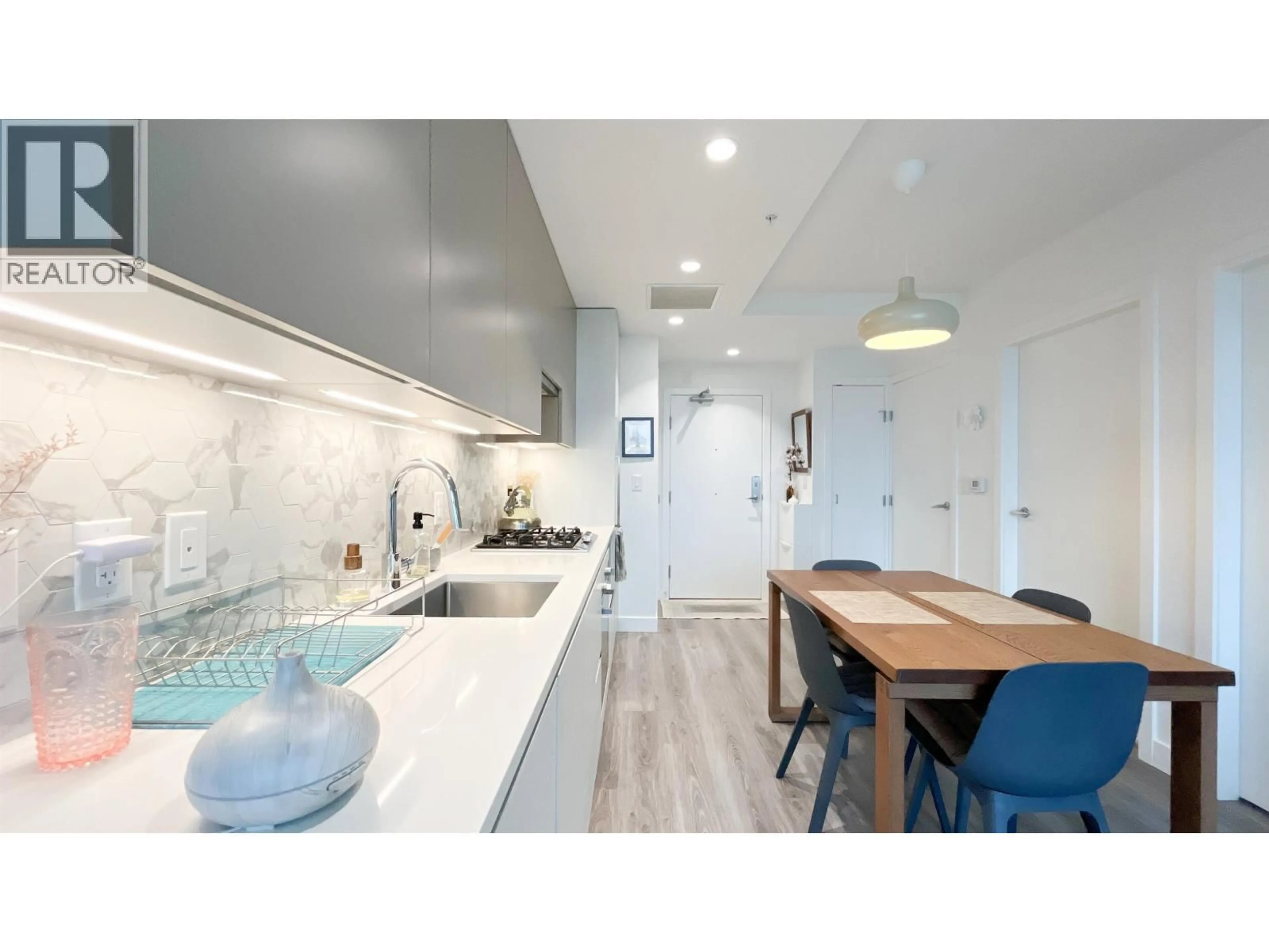 Open concept kitchen, ceramic/tile floor for 210 - 8181 CHESTER STREET, Vancouver British Columbia V5X0J9
