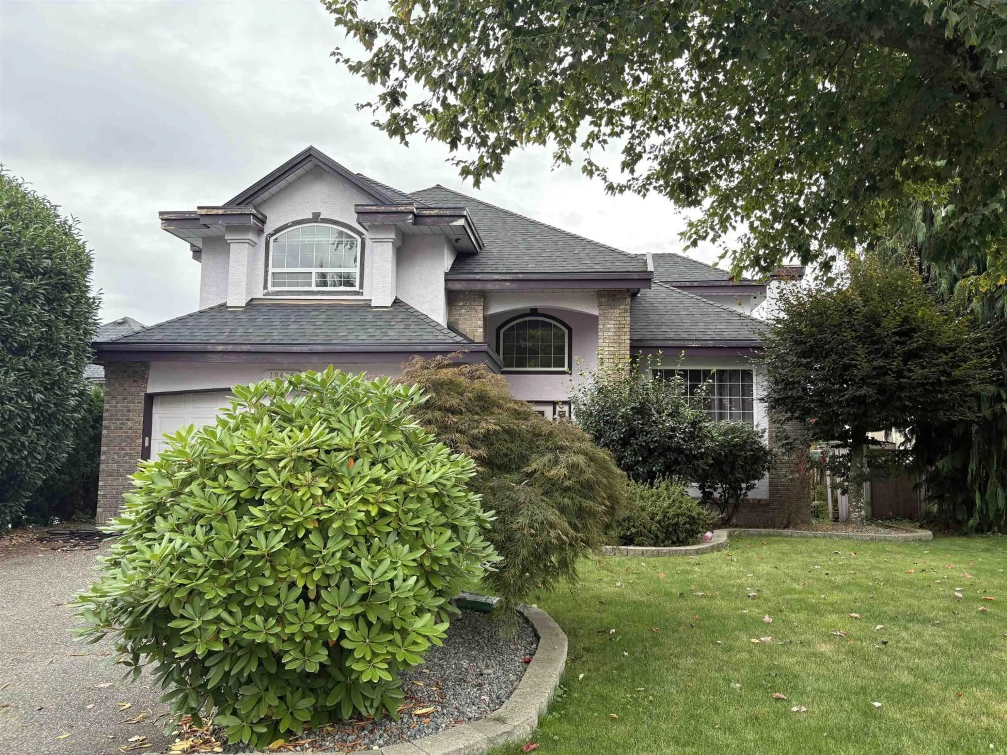 Home with vinyl exterior material, street for 10476 169A, Surrey British Columbia V4N3L9