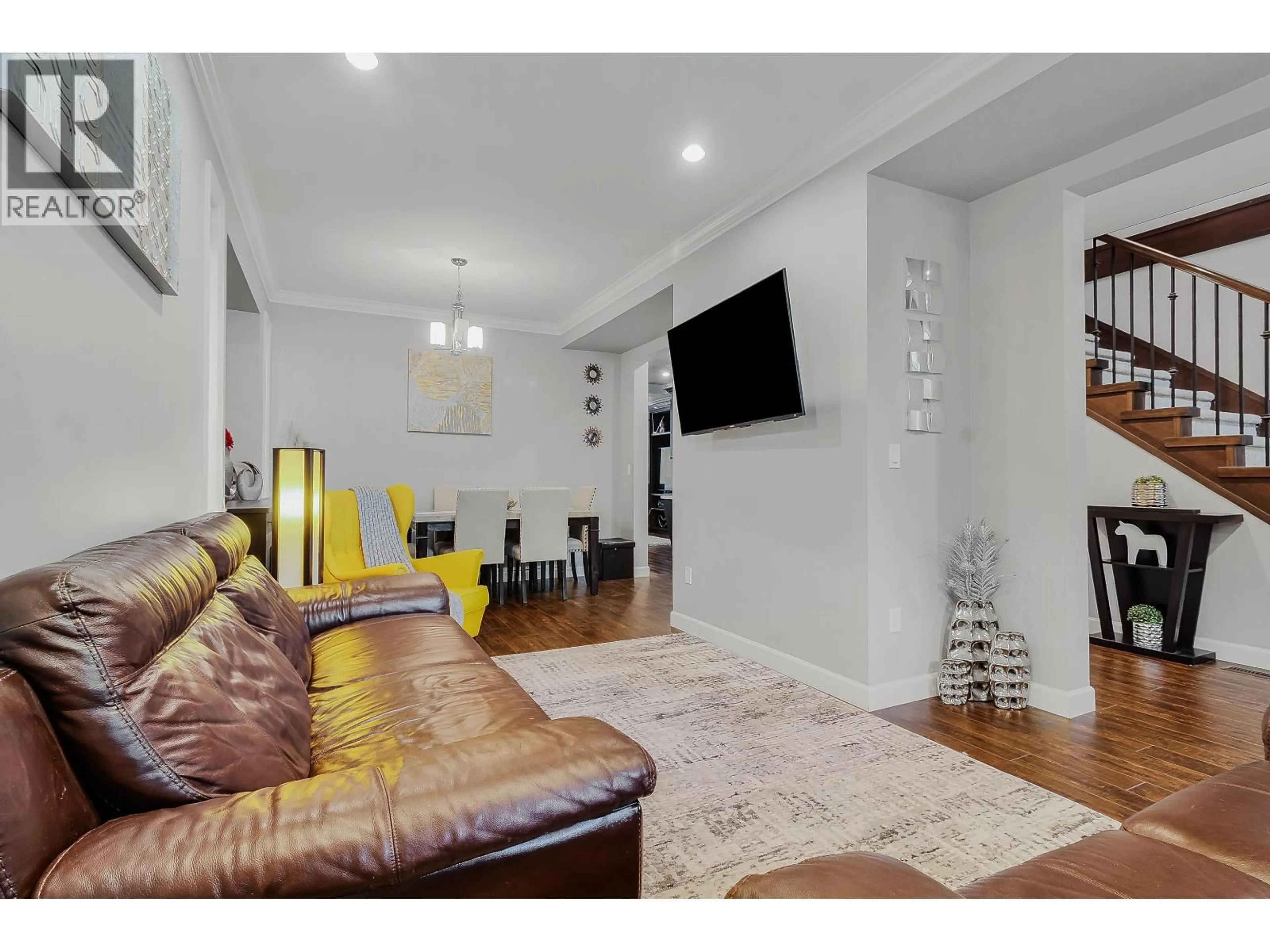 Living room with furniture, wood/laminate floor for 23942 DEWDNEY TRUNK ROAD, Maple Ridge British Columbia V4R1W2