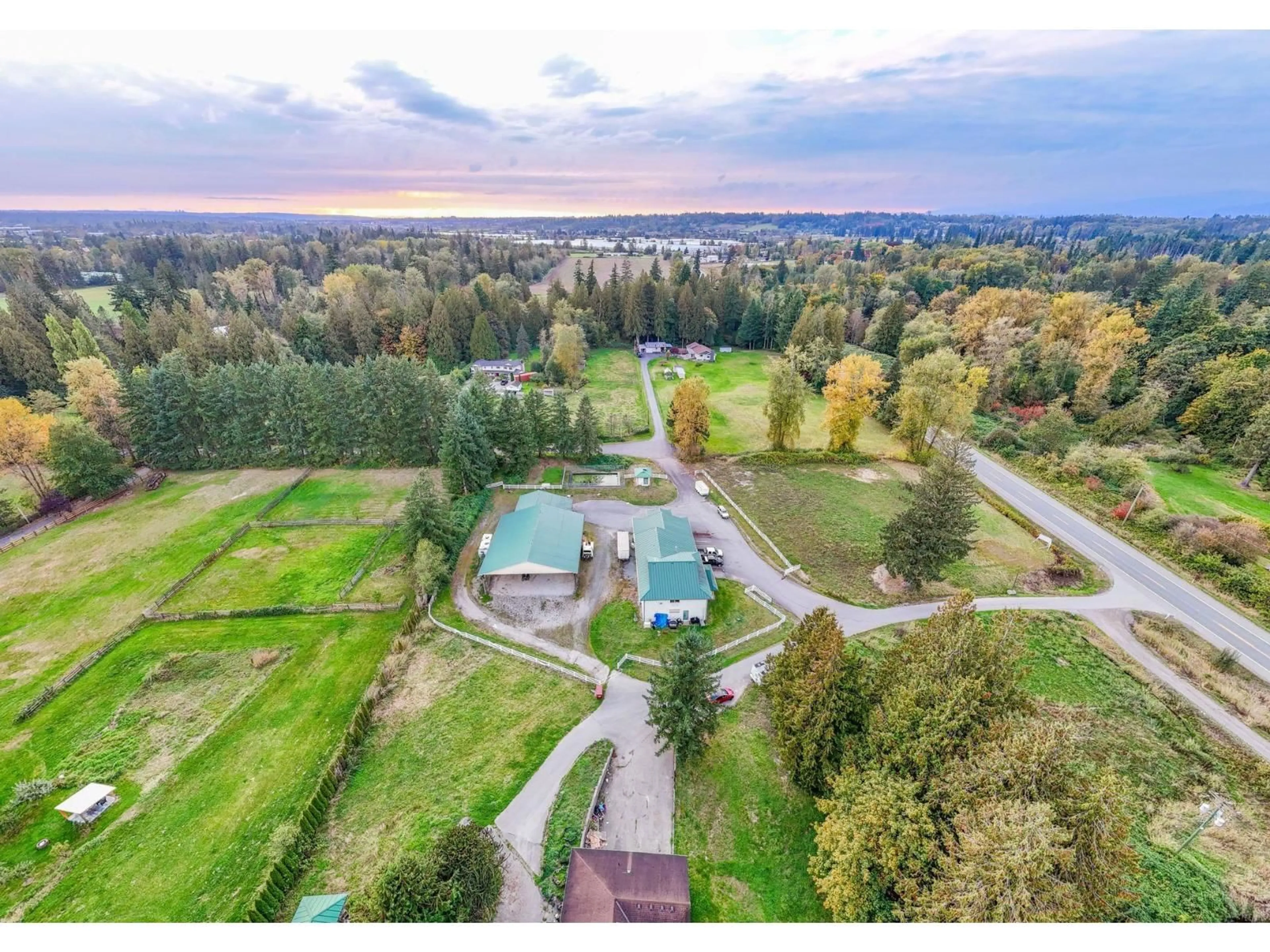 A pic from outside/outdoor area/front of a property/back of a property/a pic from drone, water/lake/river/ocean view for 22970 NO 10 HWY, Langley British Columbia V2Y2J7