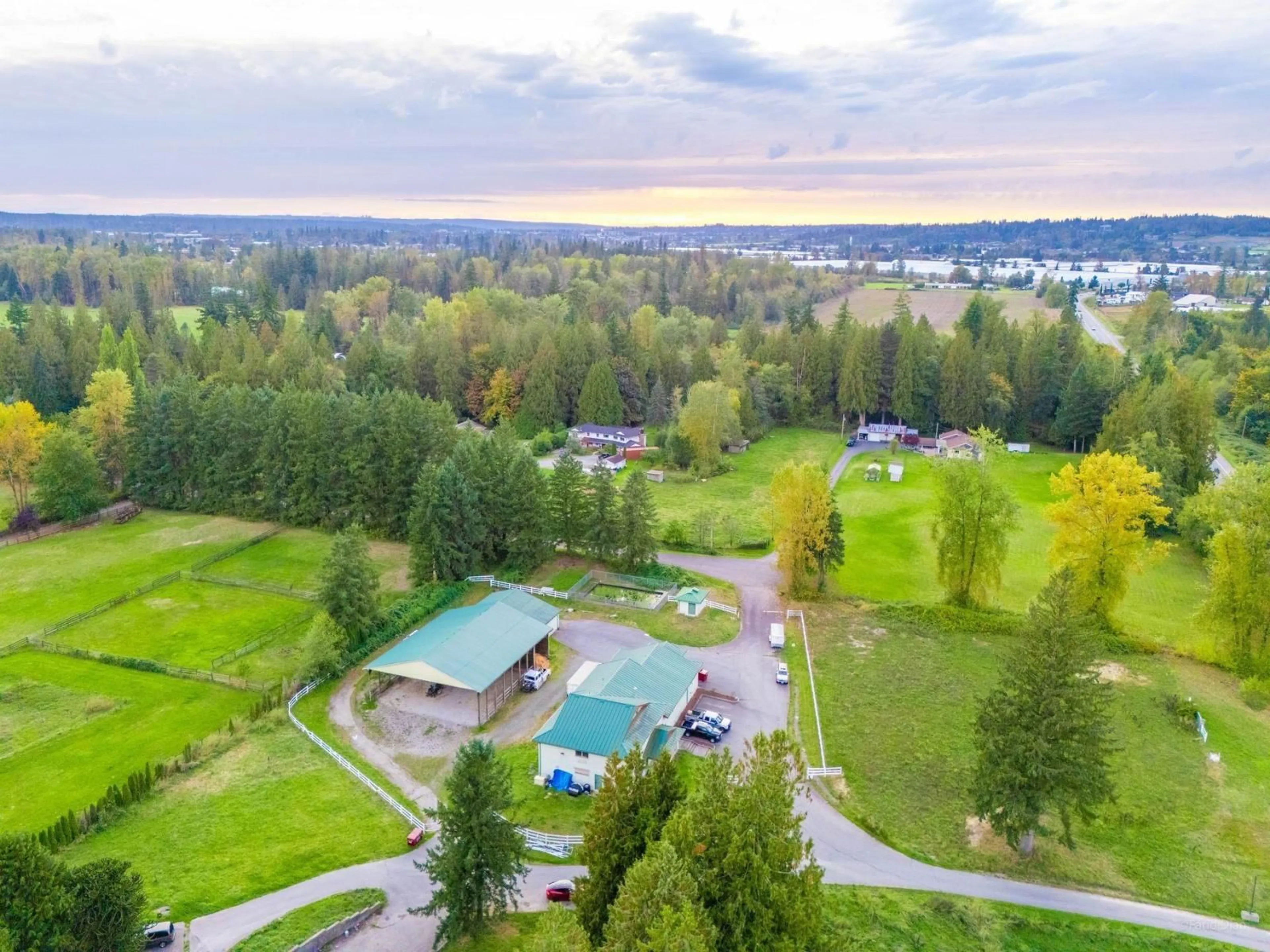 A pic from outside/outdoor area/front of a property/back of a property/a pic from drone, water/lake/river/ocean view for 22970 NO 10 HWY, Langley British Columbia V2Y2J7