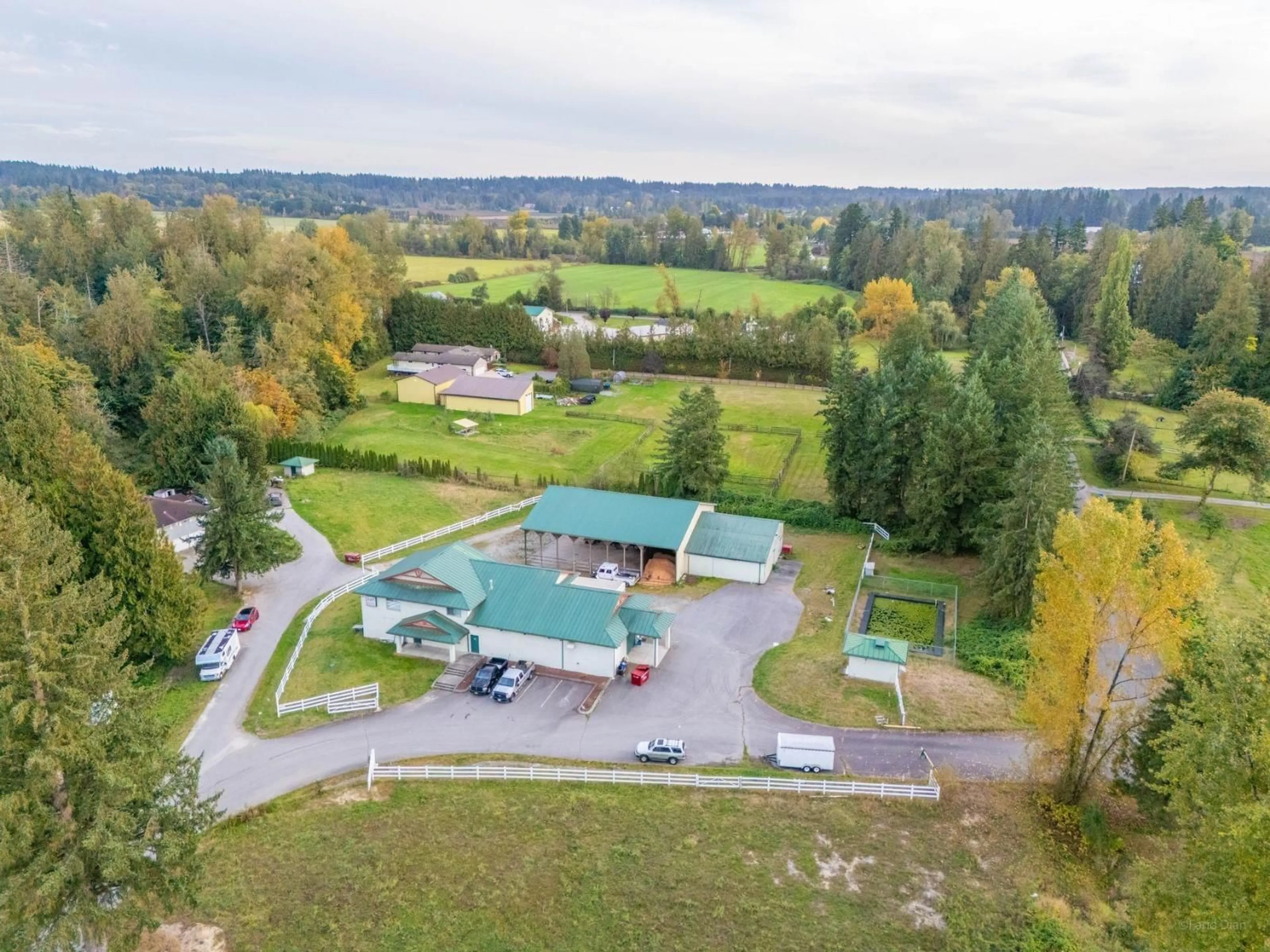 A pic from outside/outdoor area/front of a property/back of a property/a pic from drone, water/lake/river/ocean view for 22970 NO 10 HWY, Langley British Columbia V2Y2J7