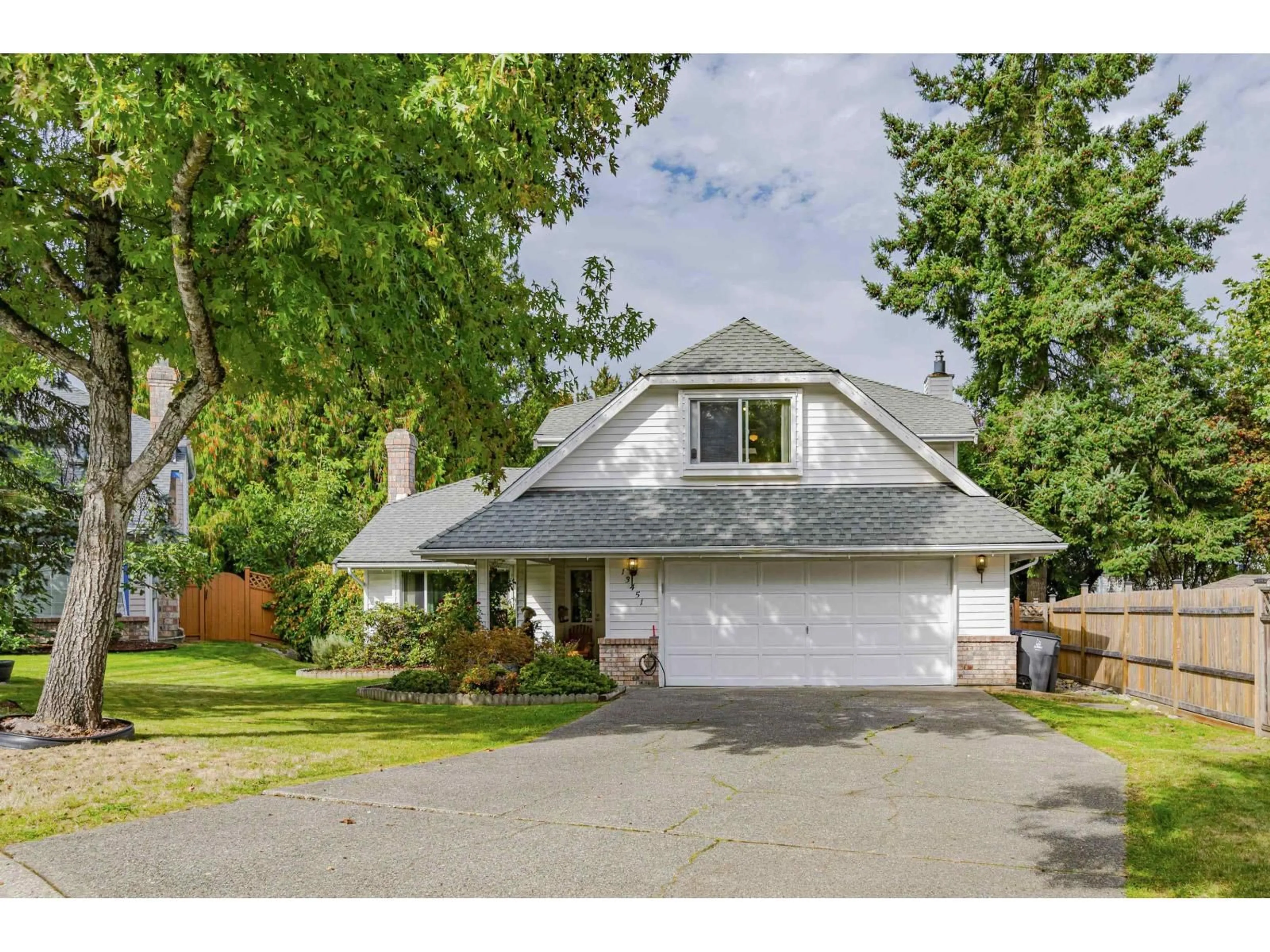 Home with vinyl exterior material, street for 13451 60A, Surrey British Columbia V3X1M1