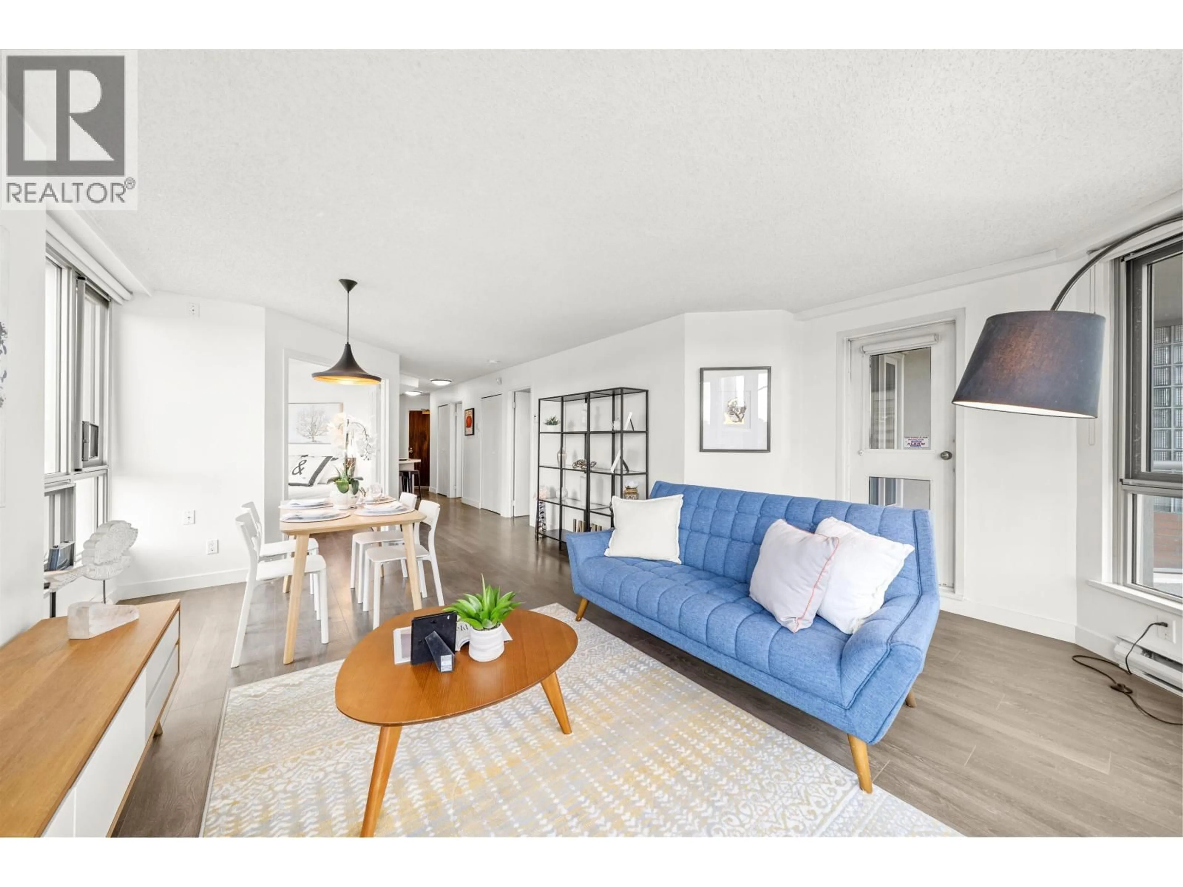 Living room with furniture, wood/laminate floor for 603 - 1625 HORNBY STREET, Vancouver British Columbia V6Z2M2