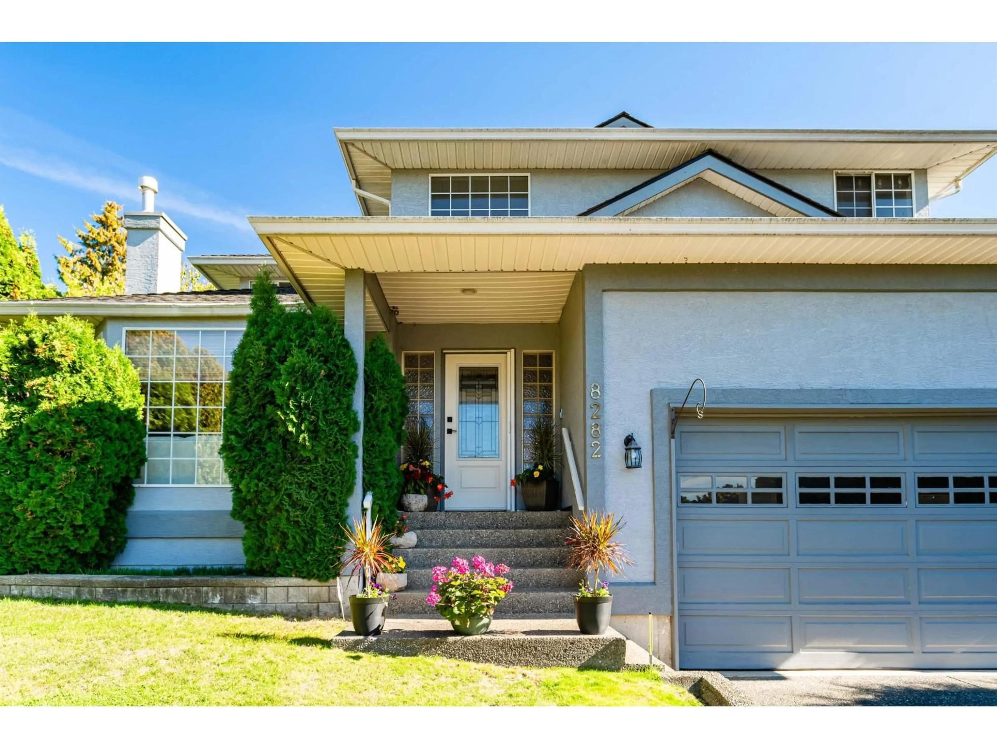 Home with vinyl exterior material, street for 8282 153B, Surrey British Columbia V3S8K6