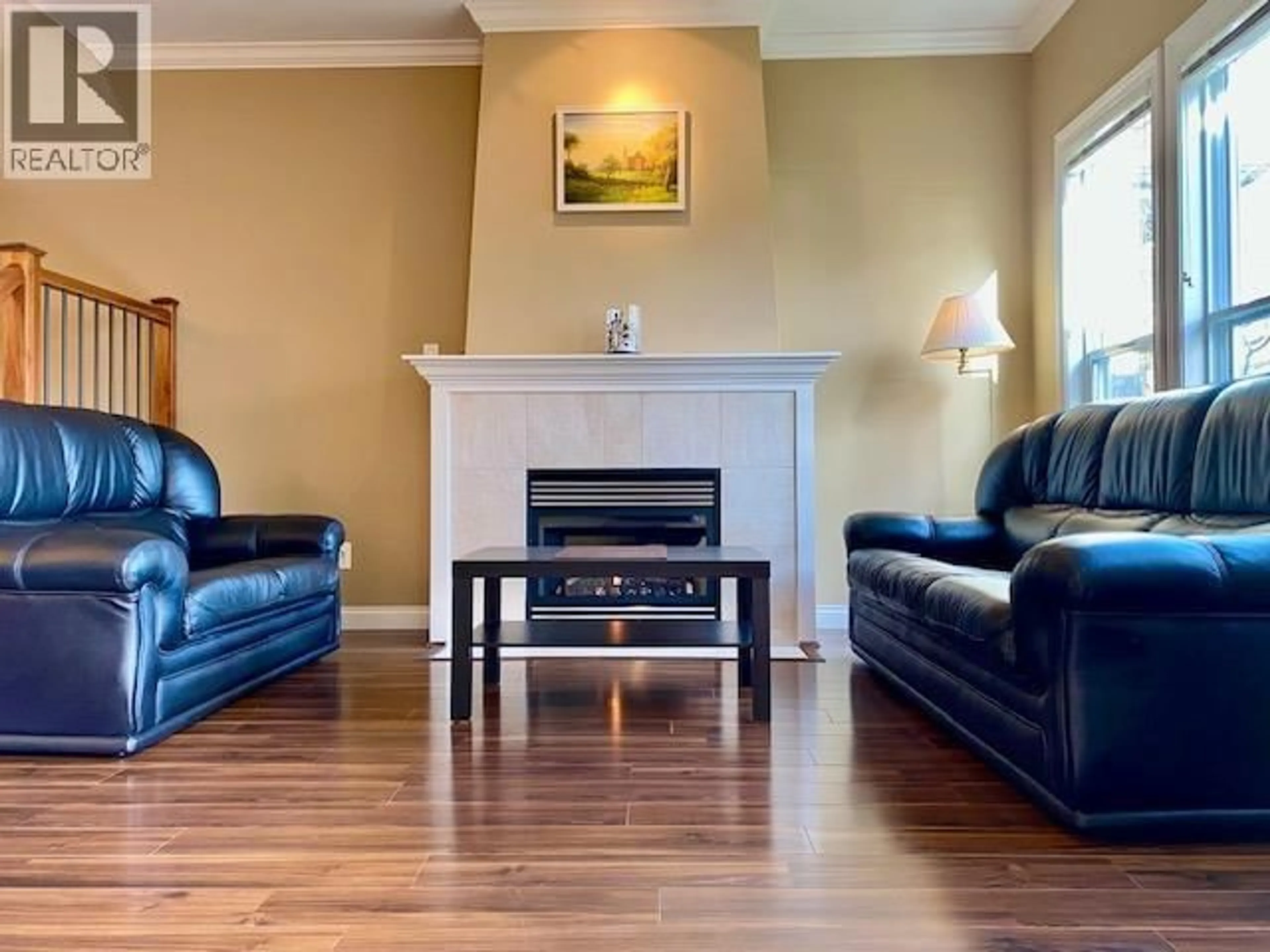 Living room with furniture, wood/laminate floor for 4 - 6733 LIVINGSTONE PLACE, Richmond British Columbia V7C5V8